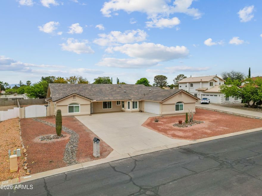 Gorgeous custom home in a highly sought-after Country Club location on a quiet, well-maintained road. Featuring 3 bedrooms plus a den/office with built-in desk, this split floor plan offers a spacious living room, great kitchen, and a large laundry room. Enjoy an extra-large 2-car garage with bump-out for additional parking or storage. The home has been beautifully updated with new flooring, fresh interior and exterior paint, new HVAC, water heater, and roof underlayment. Water softener included. Step outside to a sparkling pool built in 2024--perfect for relaxing or entertaining. Stunning large windows with beautiful shutters complete this must-see home!