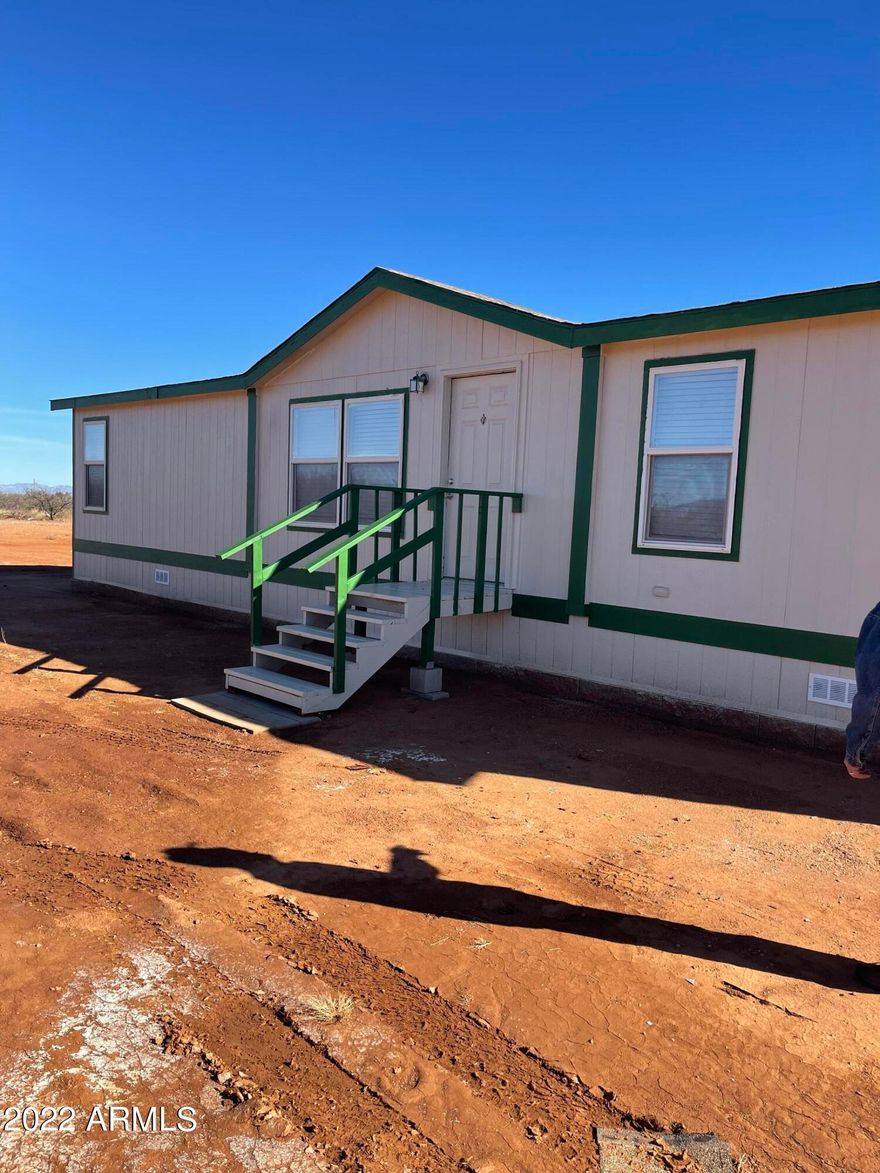Great three bedroom two bath on little over four acres.  Water included.  All new appliances.,