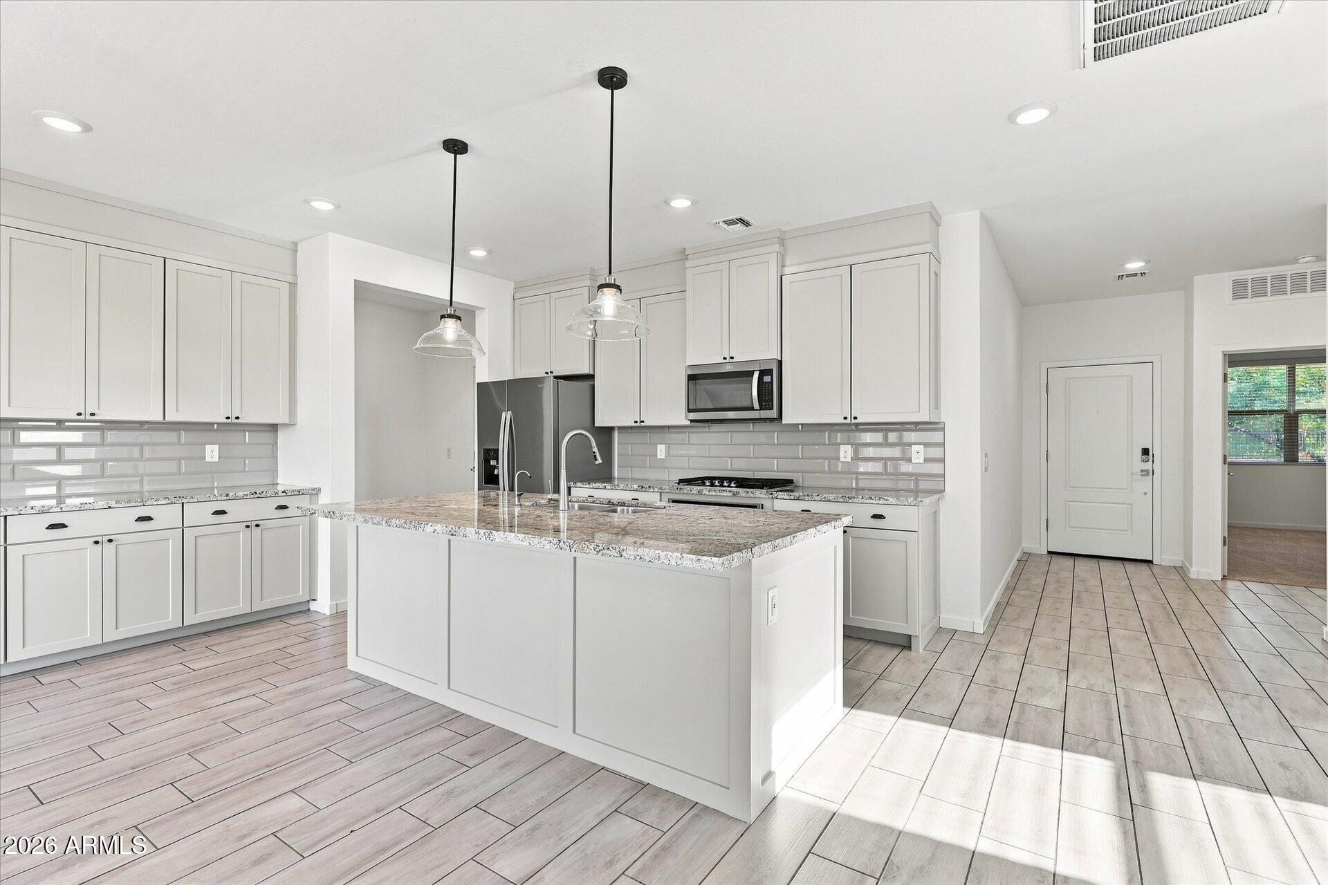 14031 W PERSHING Street