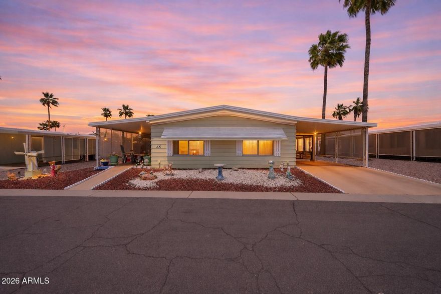 LOW LOT LEASE IN A GATED 55+ COMMUNITY -
NEW AC UNIT & NEW WATER HEATER-
FINANCING AVAILABLE.

Great location with quick access to the 202 and 60.

Oversized, private lot with mature shade and a screened-in patio to enjoy the Arizona weather year round.

Being sold fully furnished outside of a few personal items. Includes appliances, furniture, two storage sheds, and an interior workshop with tools.

Extra space with an added Arizona room, storage area, and separate workshop setup.

Simple. Affordable, well-located, and the big ticket items are already done.