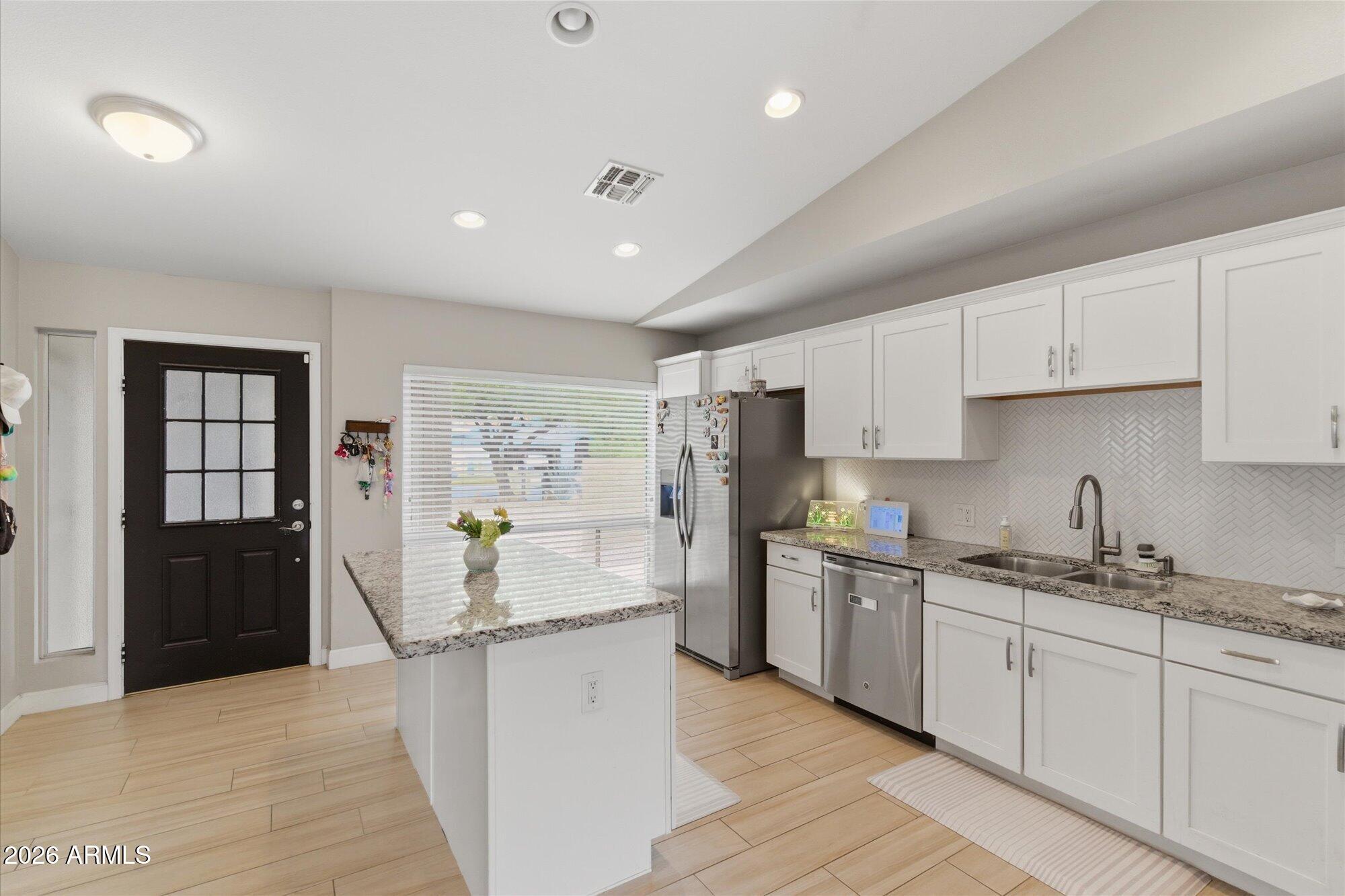 5236 W PURDUE Avenue