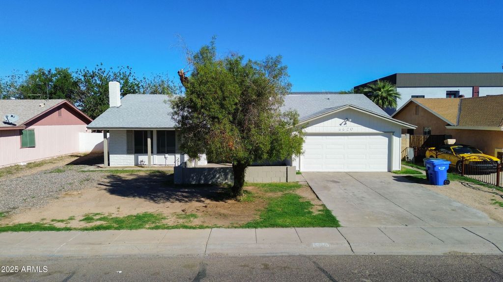 Photo of 6620 W Wolf Street, Phoenix, AZ 85033 (MLS # 6935679)
