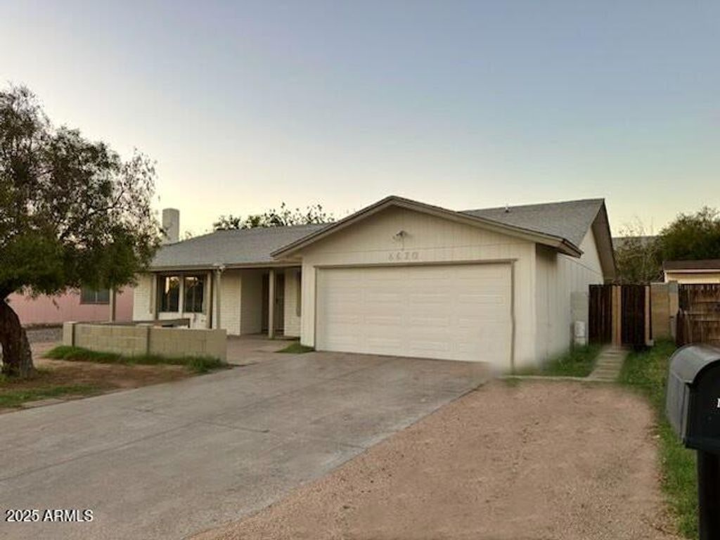 Photo of 6620 W Wolf Street, Phoenix, AZ 85033 (MLS # 6935679)