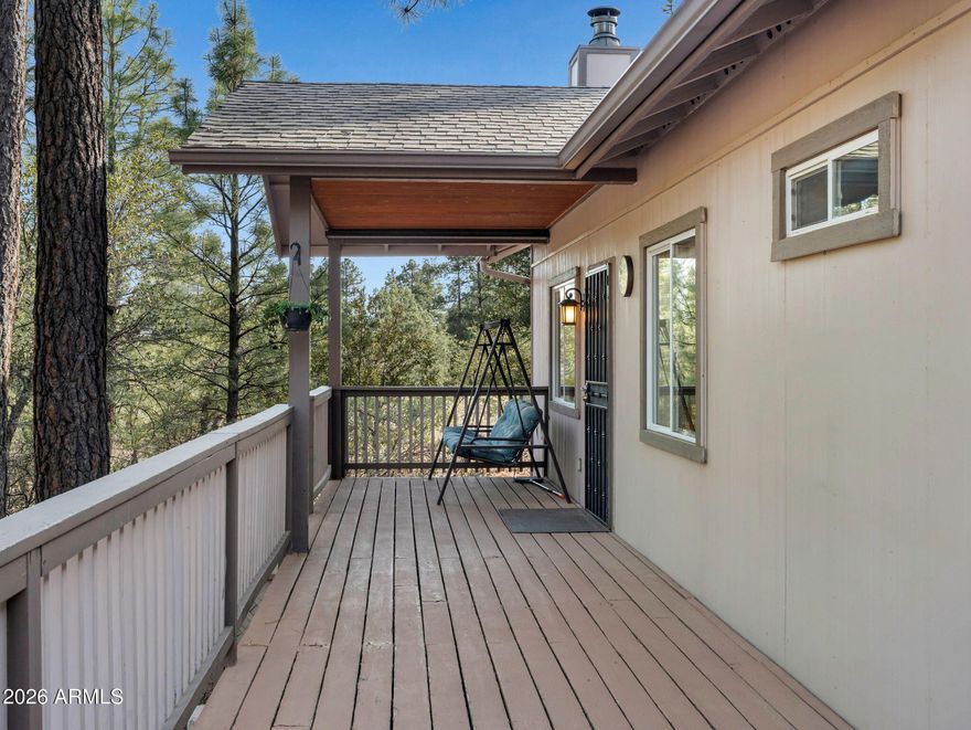 Escape to the cool pines with this stunning mountain cabin retreat in the highly desirable Pine, Arizona area, offering breathtaking views of the Mogollon Rim and surrounded by towering trees and abundant wildlife. This beautifully designed home features a spacious open-concept floor plan with a large great room, vaulted ceilings, and expansive windows that flood the space with natural light while showcasing the serene forest setting. The efficient, modern kitchen with a center island seamlessly flows into the main living area, making it perfect for entertaining or relaxing after a day of outdoor adventure. A striking rock accent wall behind the cozy wood-burning stove creates a warm, inviting atmosphere ideal for crisp mountain evenings. Enjoy generously sized bedrooms with ample storage or recreational gear. Located just a short drive from the Valley, this mountain getaway offers the perfect balance of convenience and tranquility. Experience the charm of Pine's welcoming community, known for its local restaurants, hiking trails, craft fairs, and seasonal festivals. Whether you're looking to escape the summer heat, invest in a vacation rental, or enjoy peaceful fulltime mountain living, this property delivers the ultimate Arizona lifestyle.
