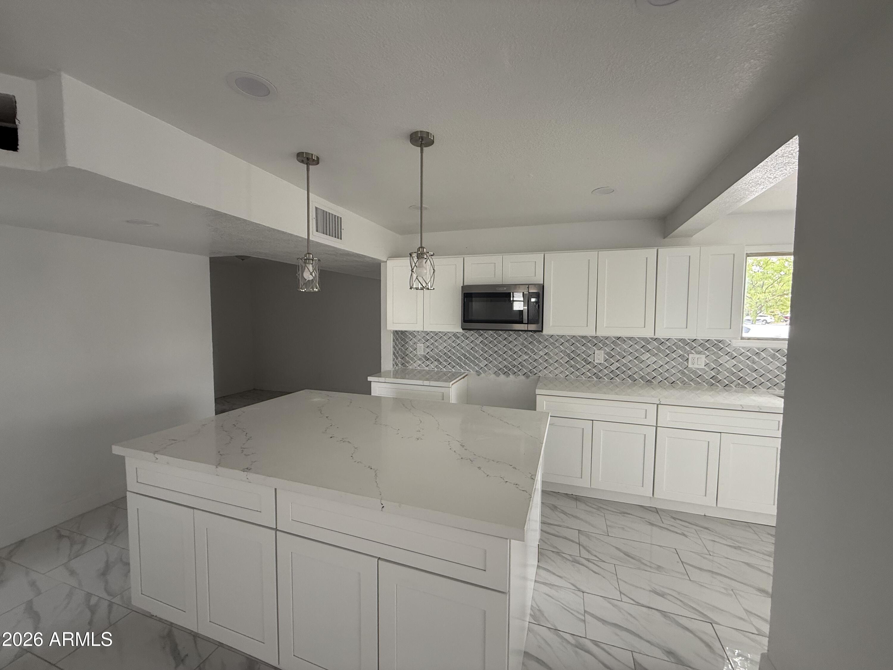 5838 W TURNEY Avenue