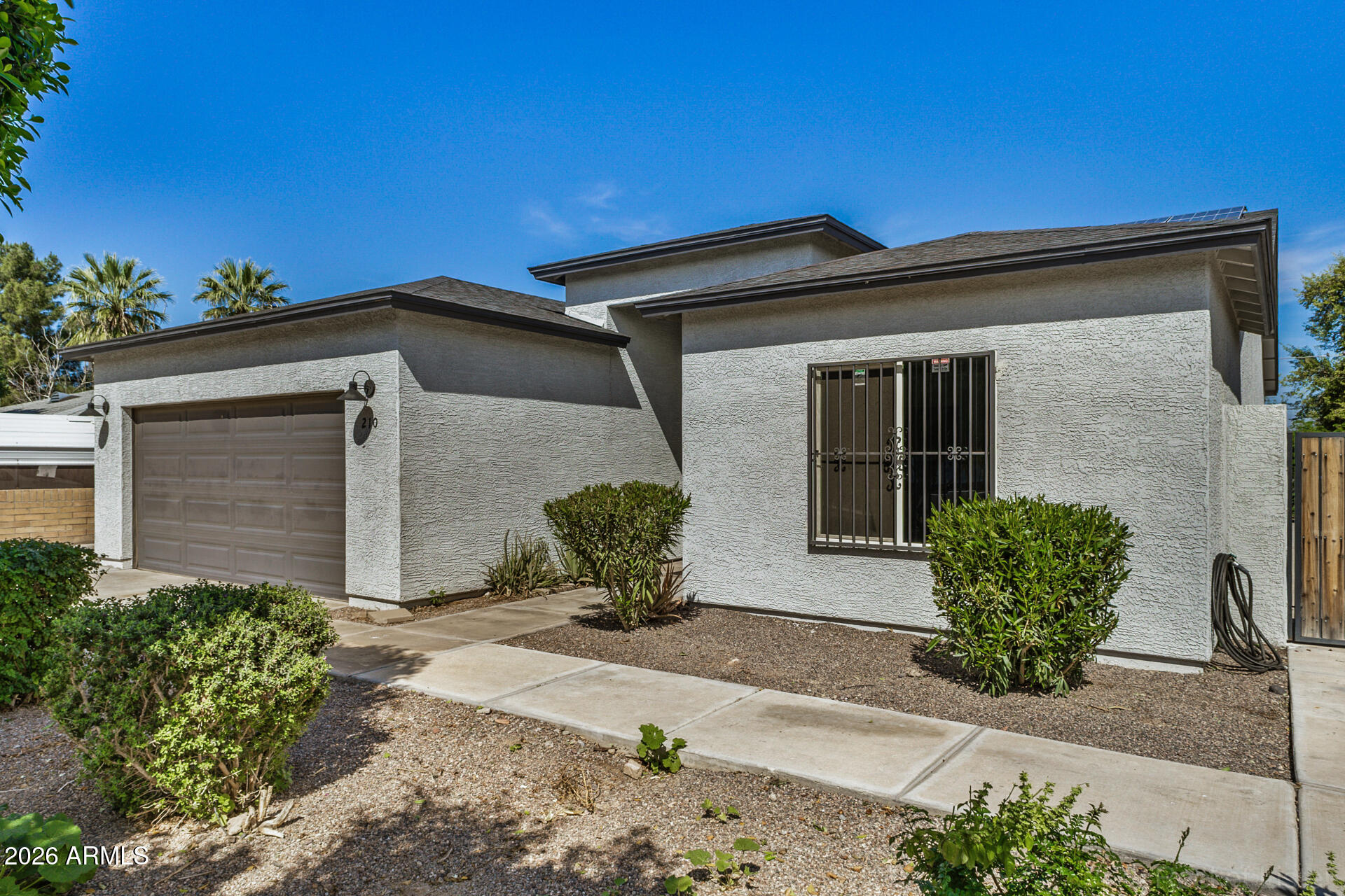 210 W SUNLAND Avenue