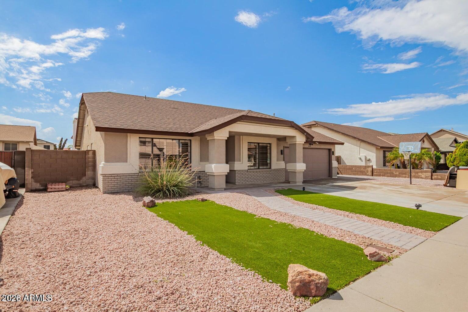 6389 W MURIEL Drive
