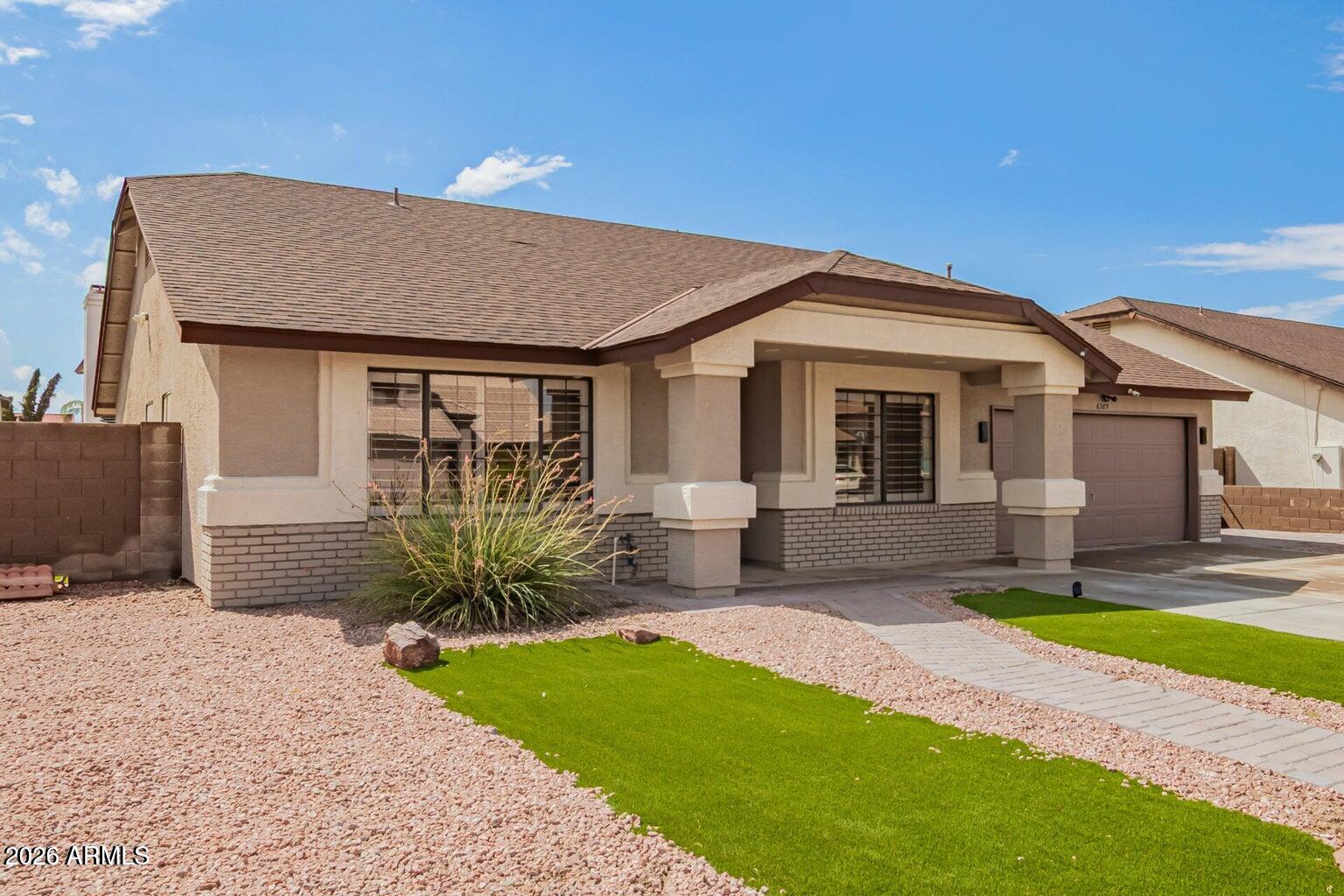 6389 W MURIEL Drive