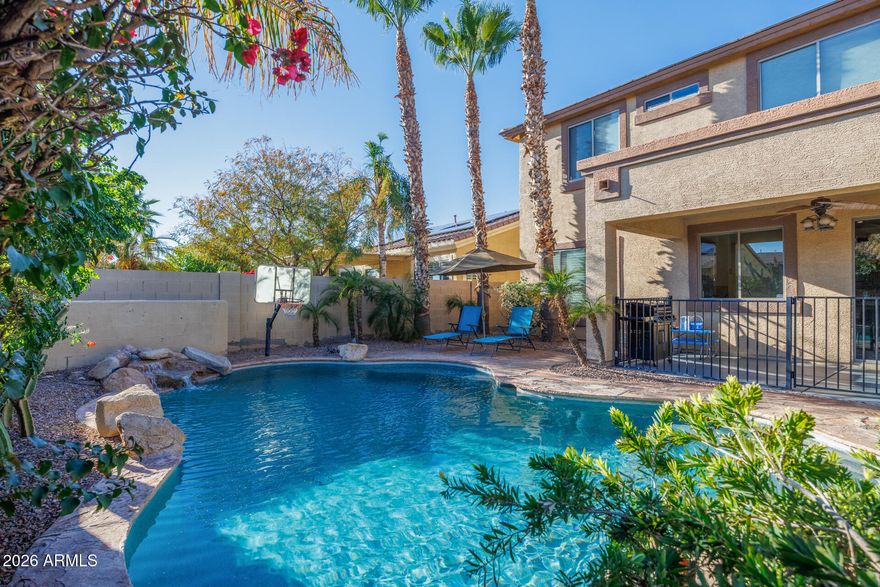 This beautiful home with a pool is located in the highly sought-after Villago subdivision. A grand entry welcomes you into a versatile floor plan featuring 4 bedrooms and 3.5 bathrooms. Inside you'll find a spacious living room, den, loft, flex space, and 3 car garage - offering endless possibilities to fit your needs. The backyard is perfect for relaxation, complete with a heated pool and thoughtfully designed landscaping. The kitchen boasts granite countertops, a gas stove, ample cabinetry, and a blend of tile and hardwood flooring. New LVP flooring was installed upstairs, in the bonus room, and in the formal living area in 2022. Other upgrades from 2022 include new pool pump + filter, new water heater, and new fridge (2023). Beat the heat this summer - poolside!