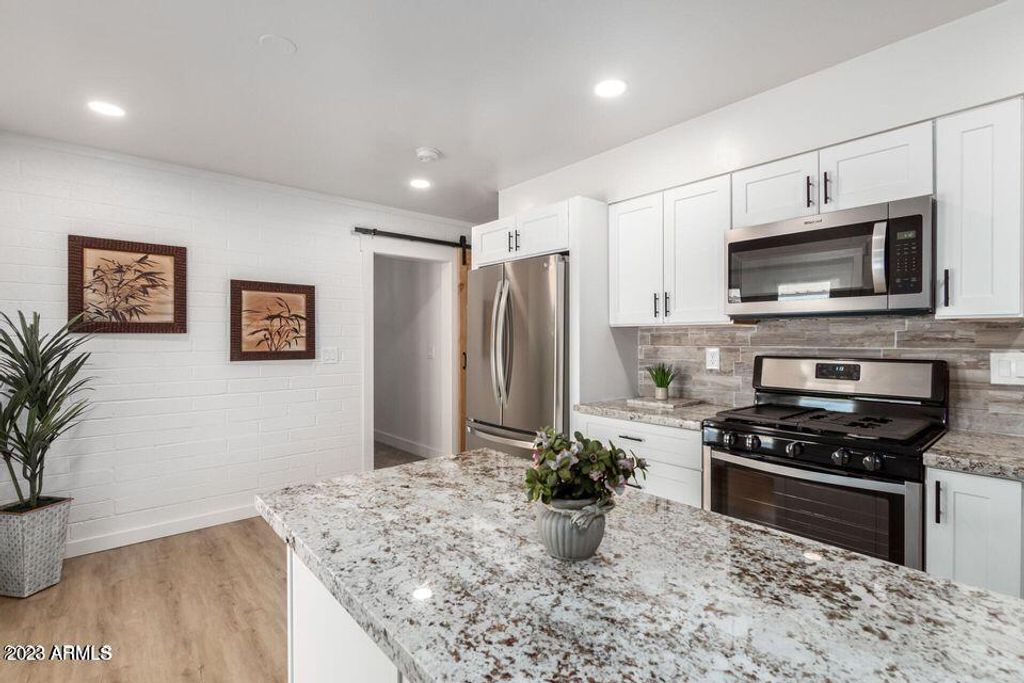 Photo of 9933 W Riviera Drive, Sun City, AZ 85351 (MLS # 6974388)