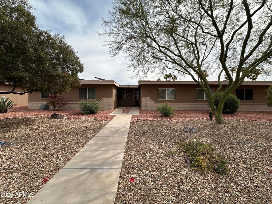 This 2 bedroom, 2 bathroom patio home in Active Adult (55+) Sun City is priced for room in the budget to make your own cosmetic enhancements.  The HVAC was replaced in 2021, the Roof recoated in 2024. Springs, motor and chain replaced on the garage opener.  The street-facing windows have been upgraded to vinyl Dual Pane for energy efficiency. The spacious back high-walled patio has a completely tiled floor.  1 ½ car garage gives you extra storage space This floor plan provides a high ceiling in the living room, two hall closets, a spacious primary bedroom walk-in closet, and sliding glass doors to your back patio.  Sun City has 7 Rec Centers, 8 golf courses, a Sun Bowl for outdoor concerts, and two bowling alleys. Plus tennis courts, pickleball and many classes, clubs and activities!