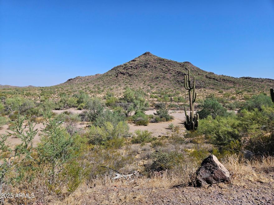 Spectacular views all directions. Own half a the hill. Rare 5 acre parcel Fantastic views. Once a home site but house has burned down. Concrete pad remains making permitting easier. Seller has additional adjacent lot with well for sale can be combined for 10 acre ranch. The perfect off-grid setup.