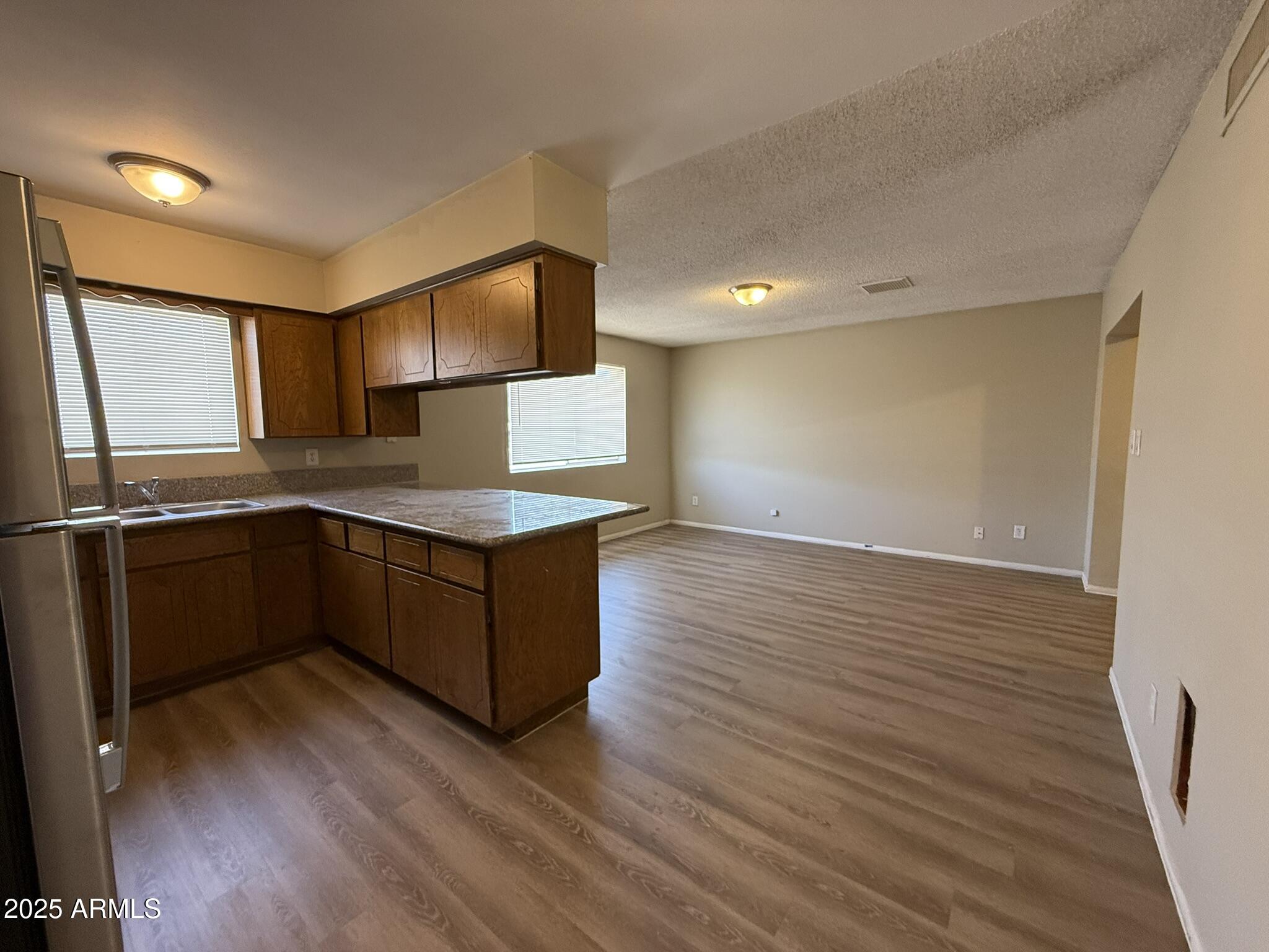 1307 E DUNLAP Avenue