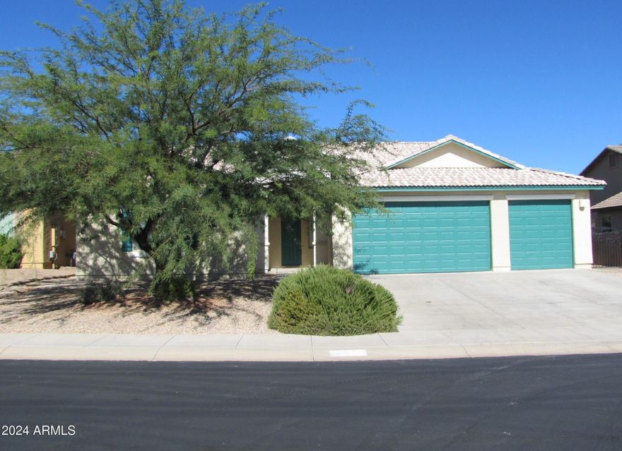 This gorgeous, 6BR/2.5BA/3CG, 2776 sq.ft. rental in the Estates at Holiday subdvision in Sierra Vista, AZ is minutes from Ft. Huachuca, schools, shopping and Canyon Vista Medical Center. The open, split floorplan has a large living area, gourmet kitchen with S/S appliances, central A/C and elevsted ceilings. The fully landscaped backyard extends the home's living space and features a lighted gazebo, outdoor kitchen w/ gas BBQ grill, firepit complete with built-in seating, a basketball court, grass lawn and fruit trees. Located on a quiet street in the Holiday Estates within walking distance to the 2 community pools, club house/Gym, sand volleyball court and playground.