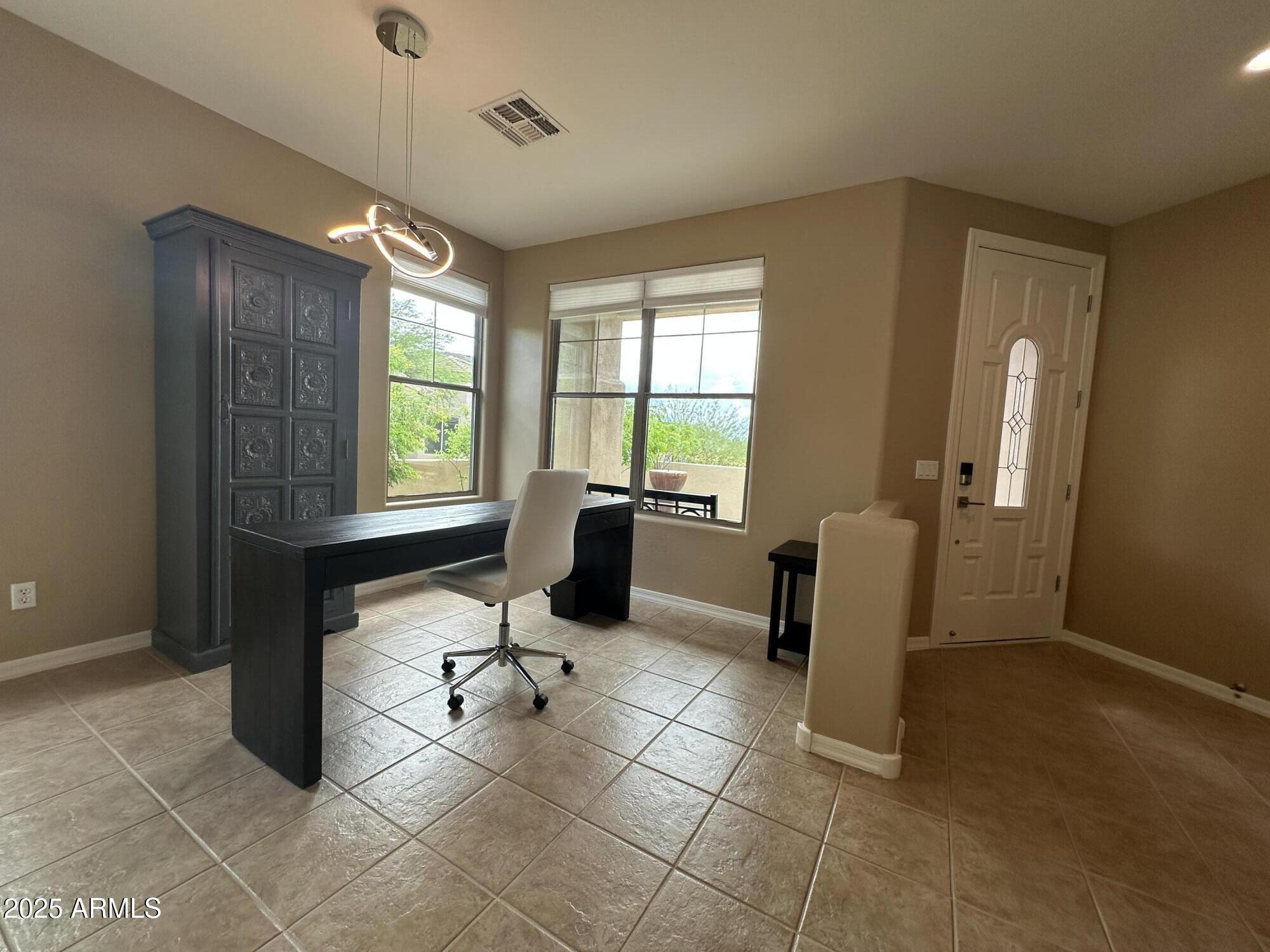 11489 E RAINTREE Drive