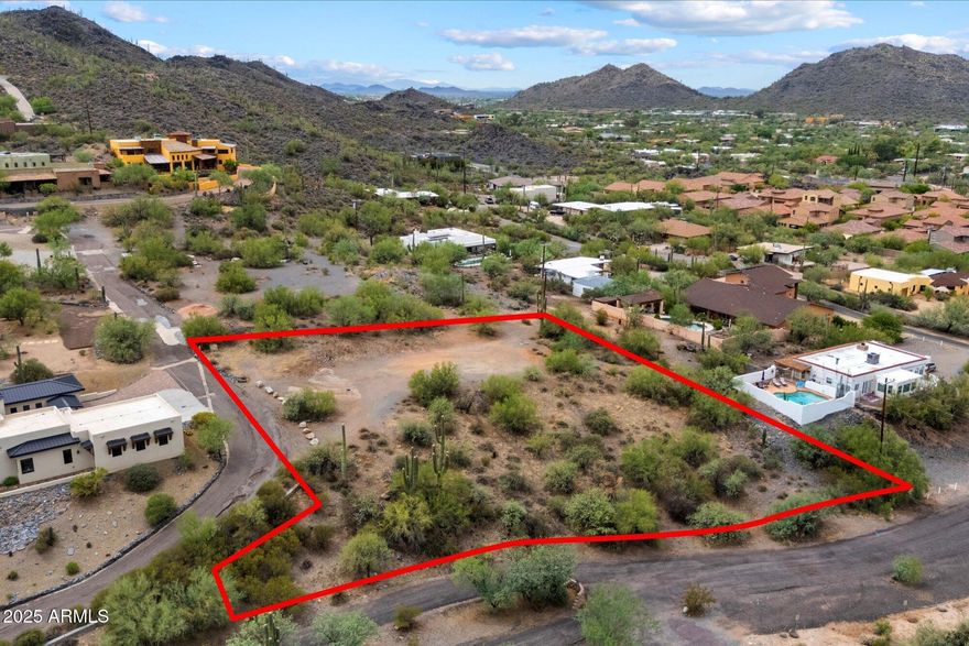 Discover a rare opportunity to own nearly an acre of residentially-zoned land in the heart of Cave Creek—perfectly positioned at the northern base of Black Mountain and ready for your dream home, with water and power at the property line and a cleared building pad. Enjoy breathtaking views of Black Mountain to the south and sweeping panoramic views of Cave Creek and surrounding mountain ranges to the north, all surrounded by natural Sonoran Desert beauty and towering saguaros. Just steps from the Black Mountain hiking trail, within walking distance to Frontier Town, Buffalo Chip, The Grotto, and more local favorites, and an easy drive to golf courses, shopping, dining, and freeway access. A prime location to build your private desert retreat with the charm of Cave Creek at your doorstep. Buyer to independently verify all facts and material information, including but not limited to lot lines, zoning, utilities, easements, building requirements, and any other details pertinent to the purchase and intended use of the property.