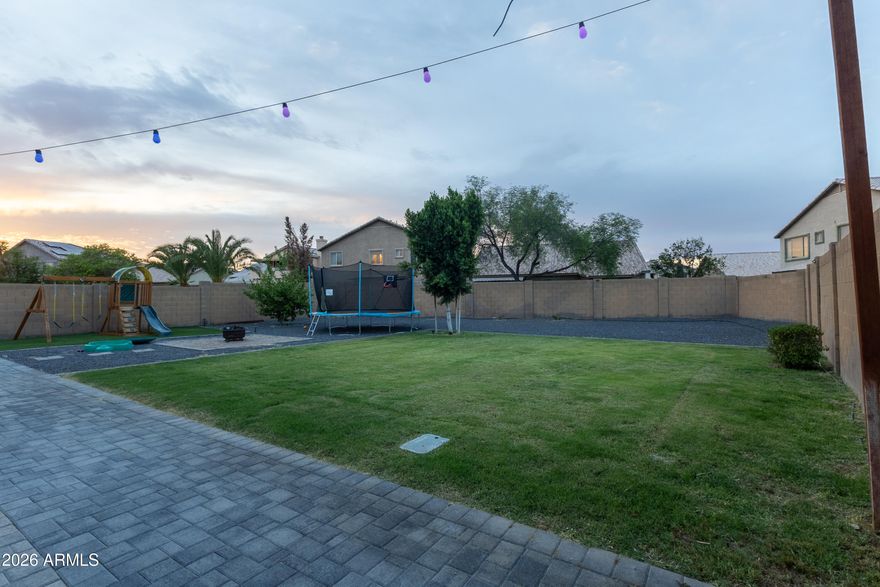 This beautifully upgraded home is in the heart of Surprise! Situated on a HUGE LOT in a desirable family-friendly neighborhood, this 4bd+Den home offers the perfect blend of comfort, style, & outdoor living. Inside, you'll find a fully upgraded interior with vaulted ceilings, modern finishes, an open & functional layout, & thoughtful touches throughout. The backyard is an entertainer's dream featuring an extensive outdoor package with plenty of space to relax, play, and enjoy Arizona living year-round. Conveniently located near parks, schools, shopping, and dining, this home checks all the boxes for families, entertaining, and everyday living. Sellers will be completing new interior & exterior paint & upgrading the kitchen backsplash once the current tenant departs 5/31. TESLA SOLAR LEASE