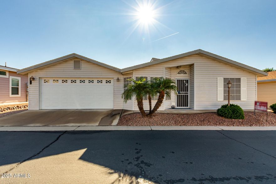 Brand new roof 20026 & newer A/C (2023) offer peace of mind from the start in this spacious & beautifully maintained 2-bedroom + den, 2-bath home w/1,762 sq ft of comfortable living. The home features a bright, open floor plan w/vaulted ceilings & wood-look flooring throughout, creating a warm & welcoming atmosphere the moment you walk in. The large living room & separate family room provide plenty of space to relax & entertain. The kitchen offers great functionality and includes the refrigerator. Skylights T/O fill the home with natural light all day long. The split floor plan includes a spacious primary suite w/a walk-in closet, garden tub, & walk-in shower. The den is perfect for a home office or hobby room & already features a built-in desk w/cabinets.