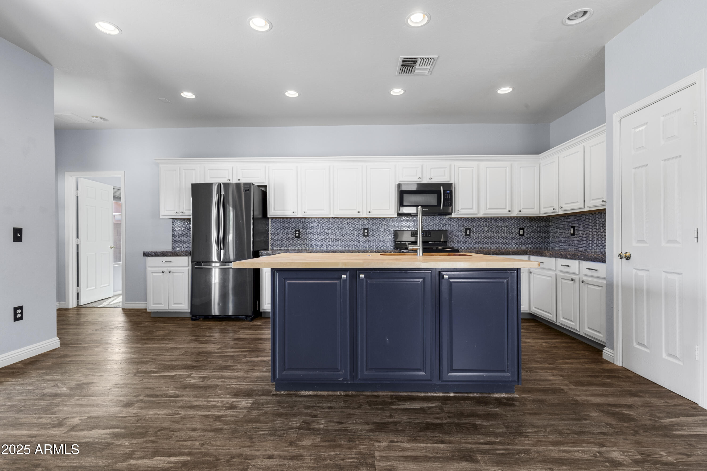 12909 W ASTER Drive
