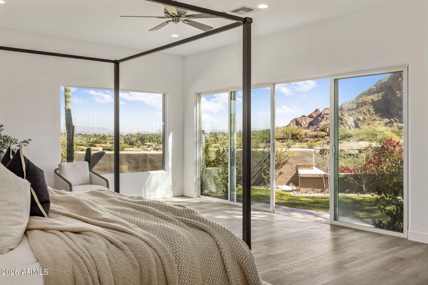 360 degree Mountain views, contemporary design, car-collector capacity, and all-on-one-level living--a rare opportunity in Hillside properties in Paradise Valley. Down the street from the new Global Ambassador, Suns Training Facility, Stk44, the Henry, Village Fitness & Tennis. Wrapped w/ view decks & multiple indoor-outdoor gathering spaces & fireplaces, gourmet kitchen, stone wine tasting room, private theatre. Split primary retreat has direct views of Praying Monk, spa bath, private yard, office-gym. Guest wing w/living room, study & 3-ensuites. 5 ensuite bedrooms incl separate 1-bedroom guest house with kitchen. An oversize, over-height 4-car garage can accommodate lifts. No HOA. Perfectly positioned at the intersection of PV and Arcadia, Reimagined in 2020 and offered for the first time to market!
