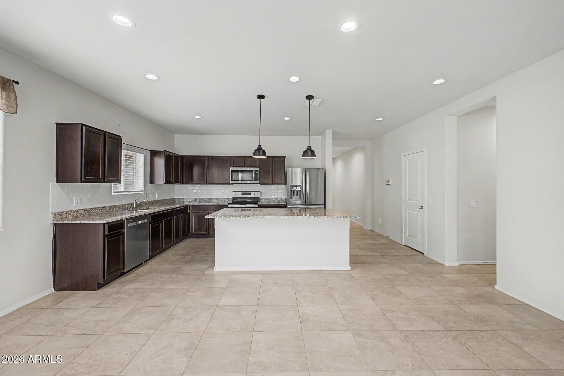 18363 W Whispering Wind Drive