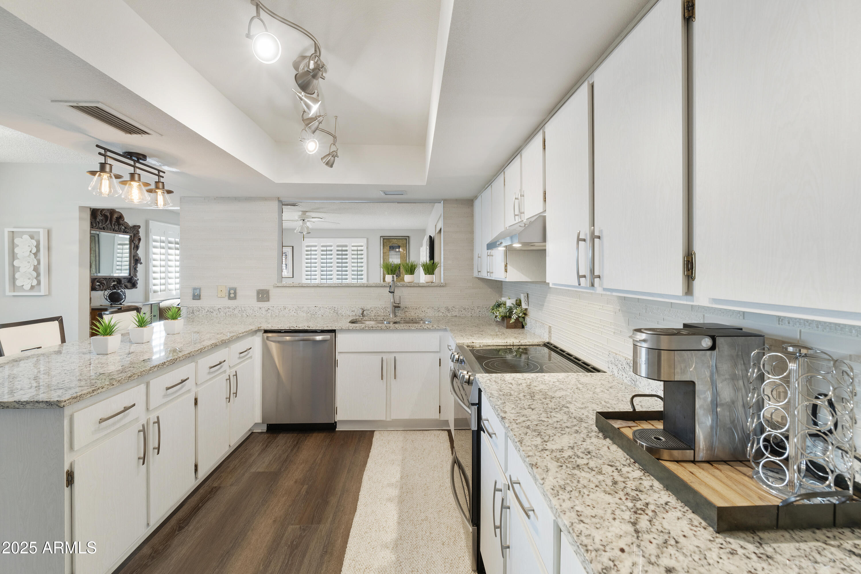 9621 E CALGARY Avenue