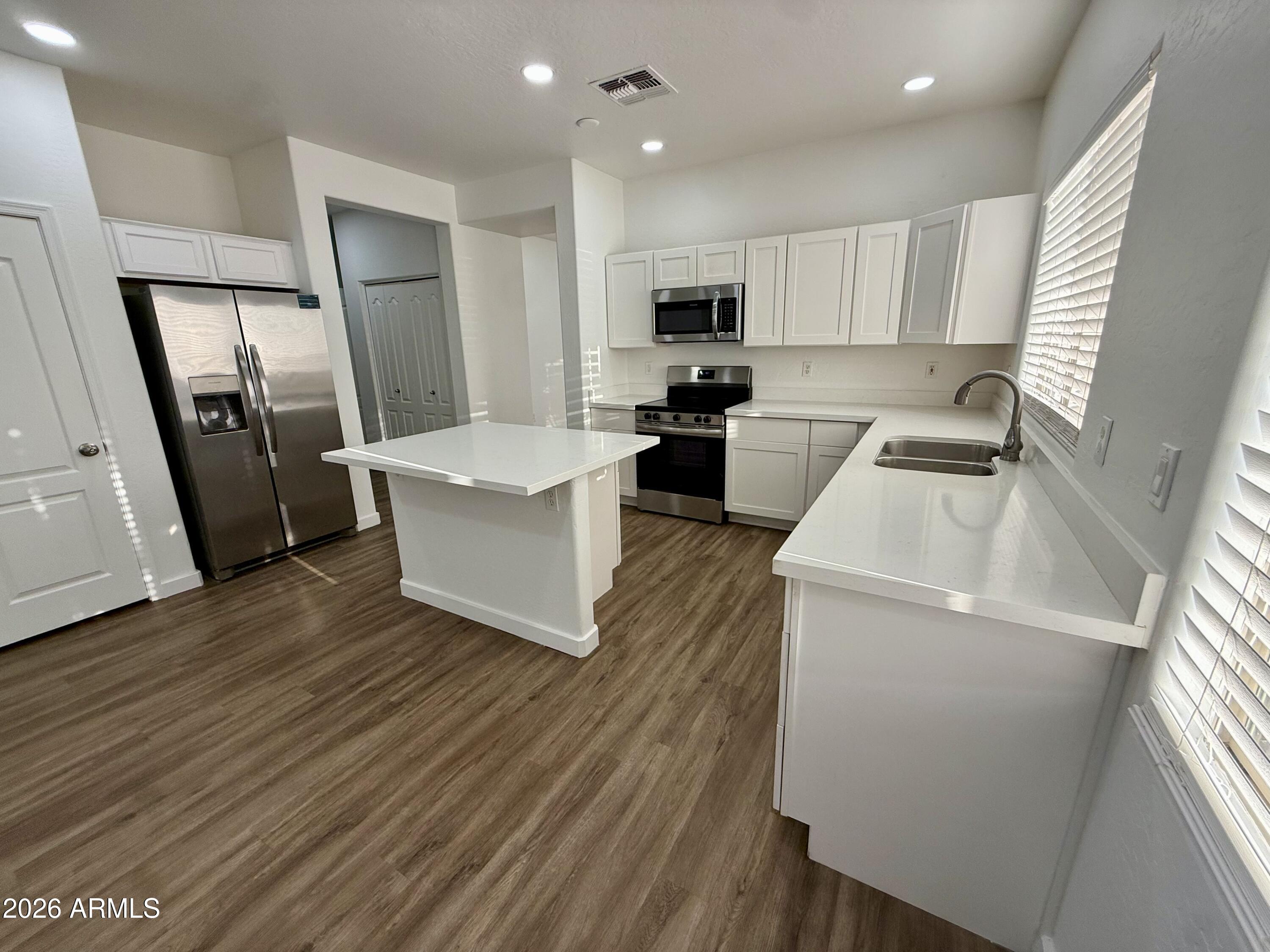 15238 W CUSTER Lane