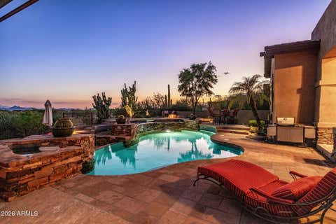 Photo of 9290 E Thompson Peak Parkway #247, Scottsdale, AZ 85255 (MLS # 7059642)
