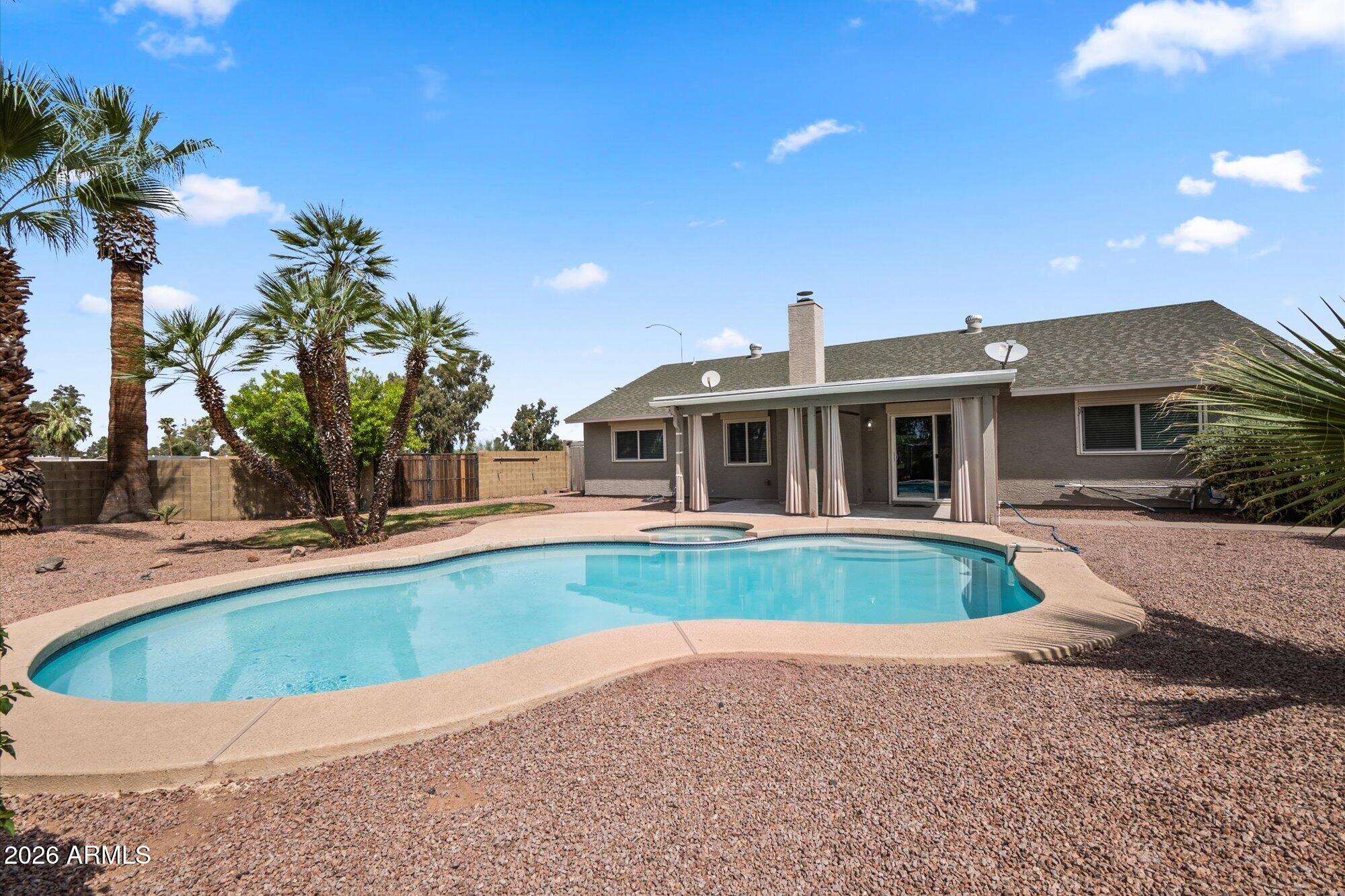7203 E PUEBLO Avenue