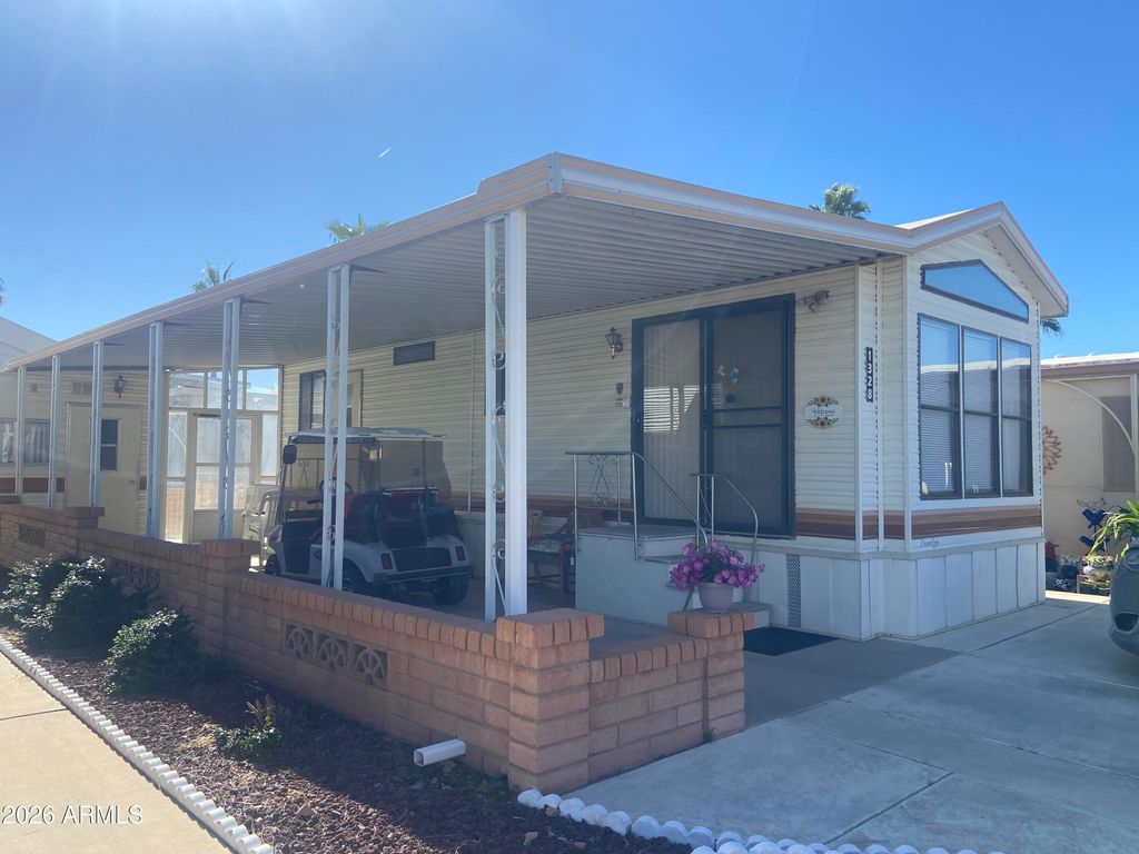 Photo of 1328 W Inuit Avenue, Apache Junction, AZ 85119 (MLS # 6979139)