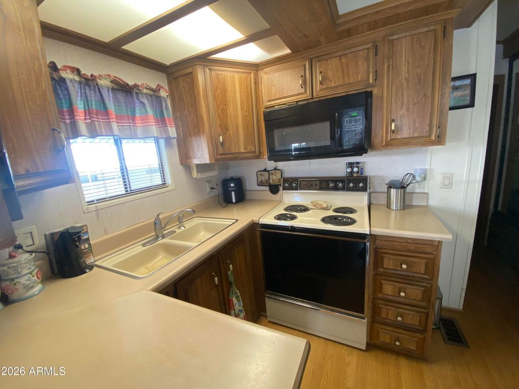 Photo of 1328 W Inuit Avenue, Apache Junction, AZ 85119 (MLS # 6979139)