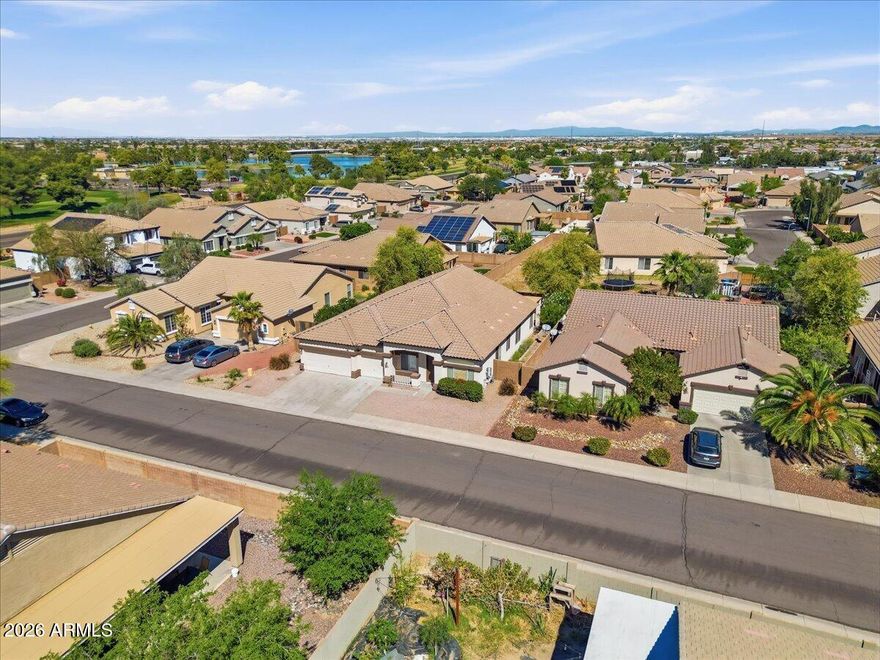 Welcome to the kind of home that checks every box for comfort, space, and simplicity. This beautifully updated single-level 4-bedroom home in Laveen offers the perfect blend of modern upgrades and functional living--ideal for families ready to settle in without the hassle of renovations.

Step inside to find a bright, open-concept layout where the living room flows seamlessly into the dining area and updated kitchen, creating a space that's perfect for both everyday living and entertaining. The kitchen has been thoughtfully refreshed with new quartz countertops, freshly painted cabinetry, stainless steel appliances, and a center island that makes meal prep and gathering effortless. The spacious primary suite offers a true retreat, complete with a large walk-in closet and a private bathroom featuring dual sinks, a separate soaking tub, and walk-in shower--giving you the space and comfort you deserve at the end of the day. With all four bedrooms on one level, the layout is both convenient and family-friendly.

Outside, you'll find a generously sized backyard with mature trees, low-maintenance landscaping, and a massive covered patio--perfect for keeping kids and pets shaded while still enjoying Arizona's outdoor lifestyle.

This home has been meticulously maintained and upgraded with new interior paint throughout, including the garage, new flooring in all bedrooms, and a newer AC unit.

Located in a quiet Laveen neighborhood with convenient access to shopping, schools, and freeway access, this home offers the space, updates, and value that today's buyers are searching for.
