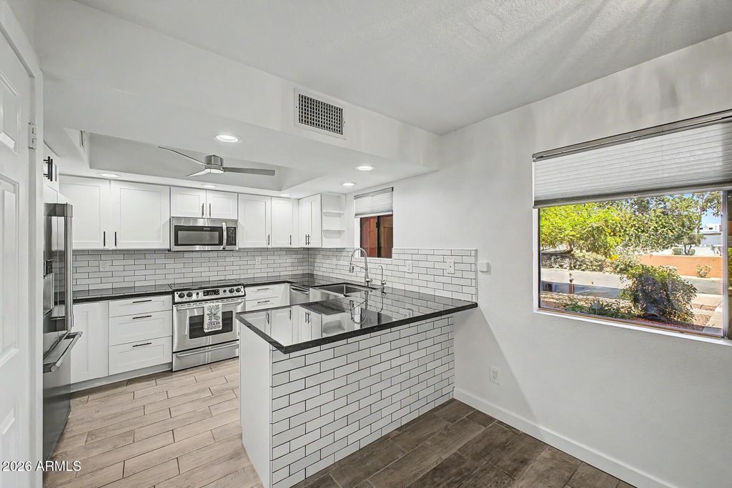 Photo of 12222 N Paradise Village Parkway S #107, Phoenix, AZ 85032 (MLS # 7031823)