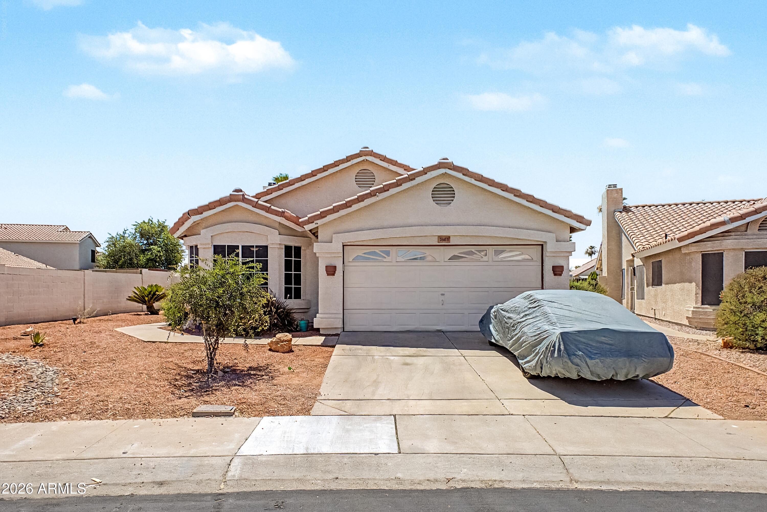 7603 W ORAIBI Drive