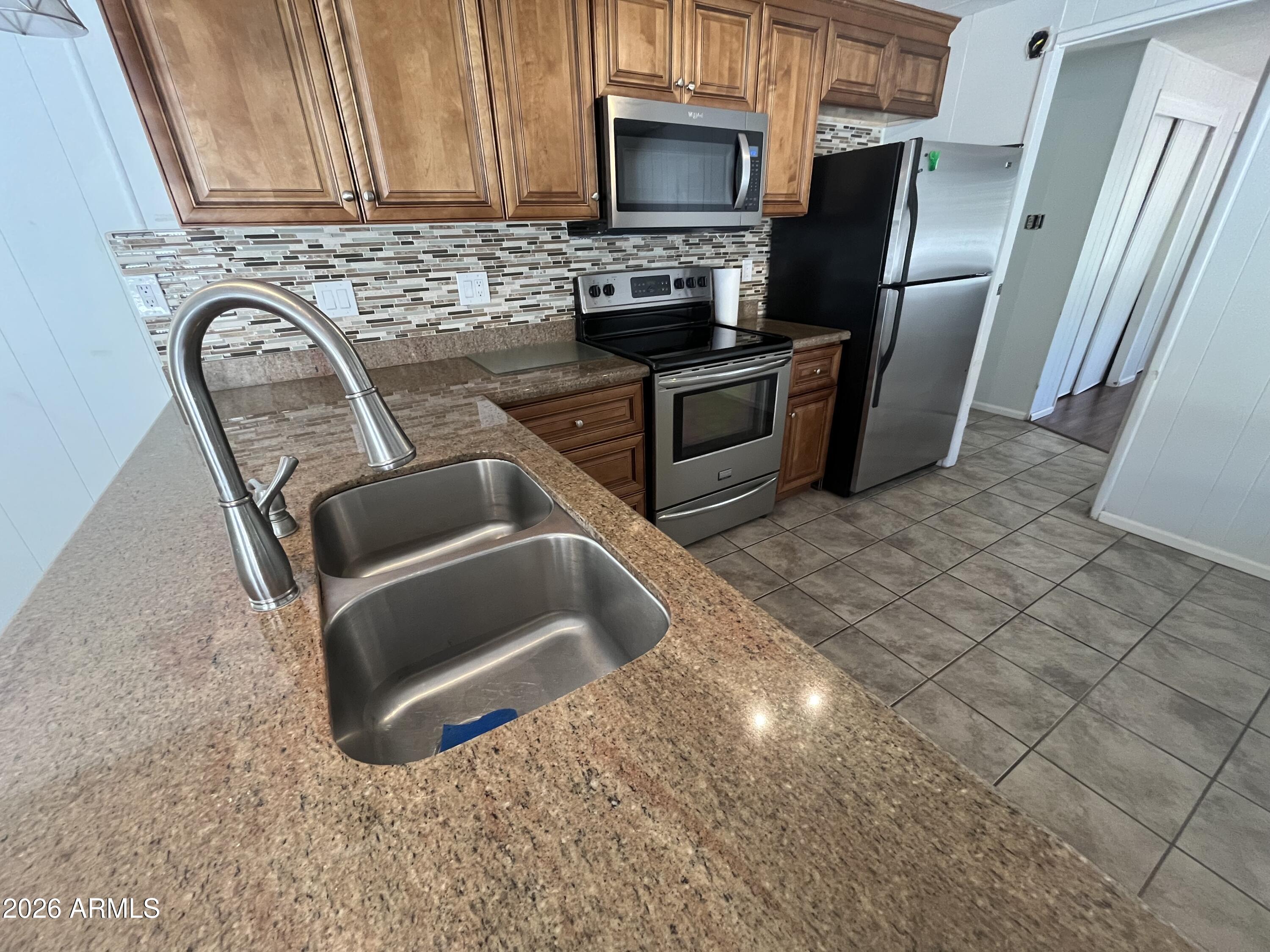 10960 N 67TH Avenue 33