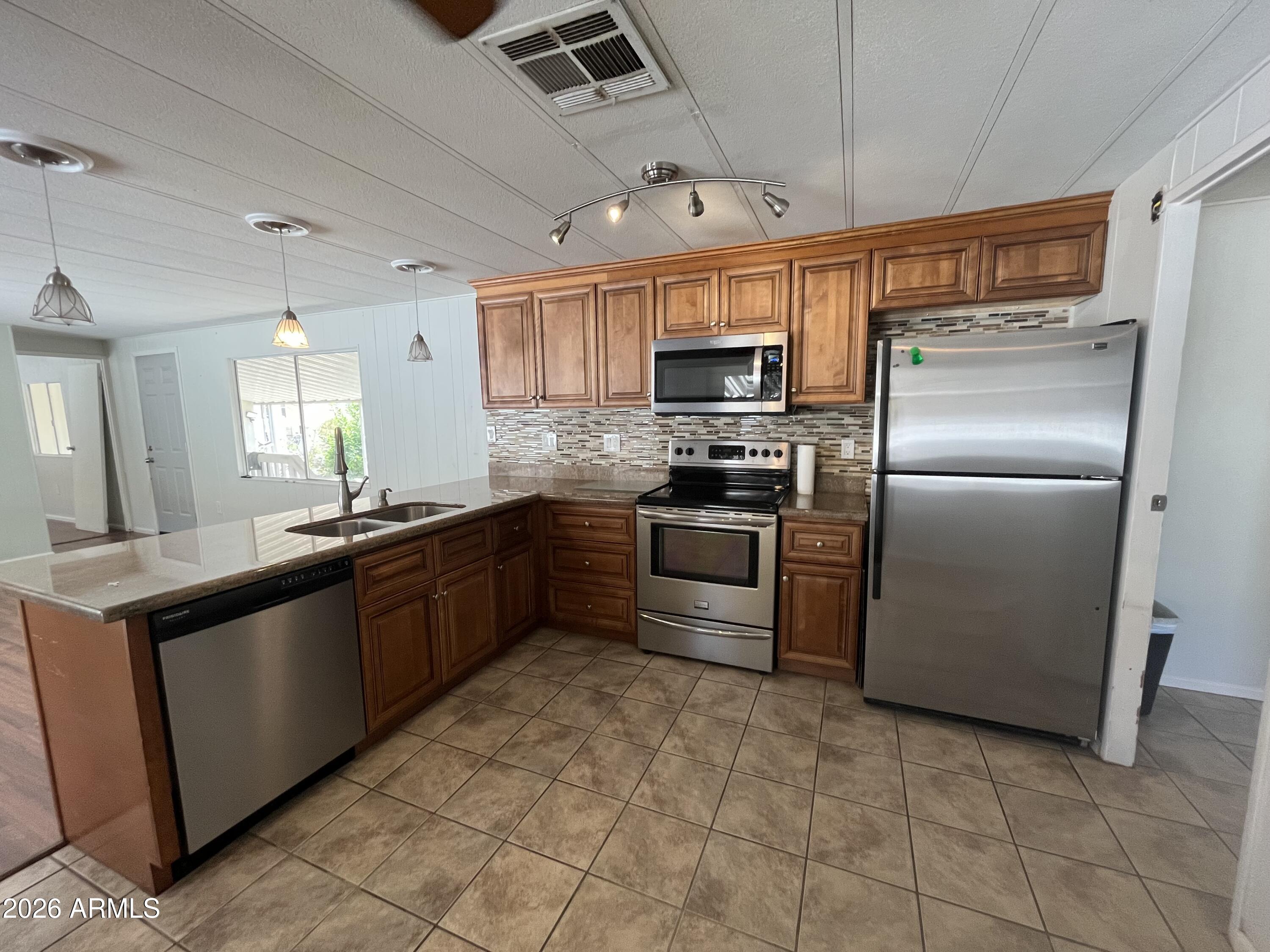 10960 N 67TH Avenue 33