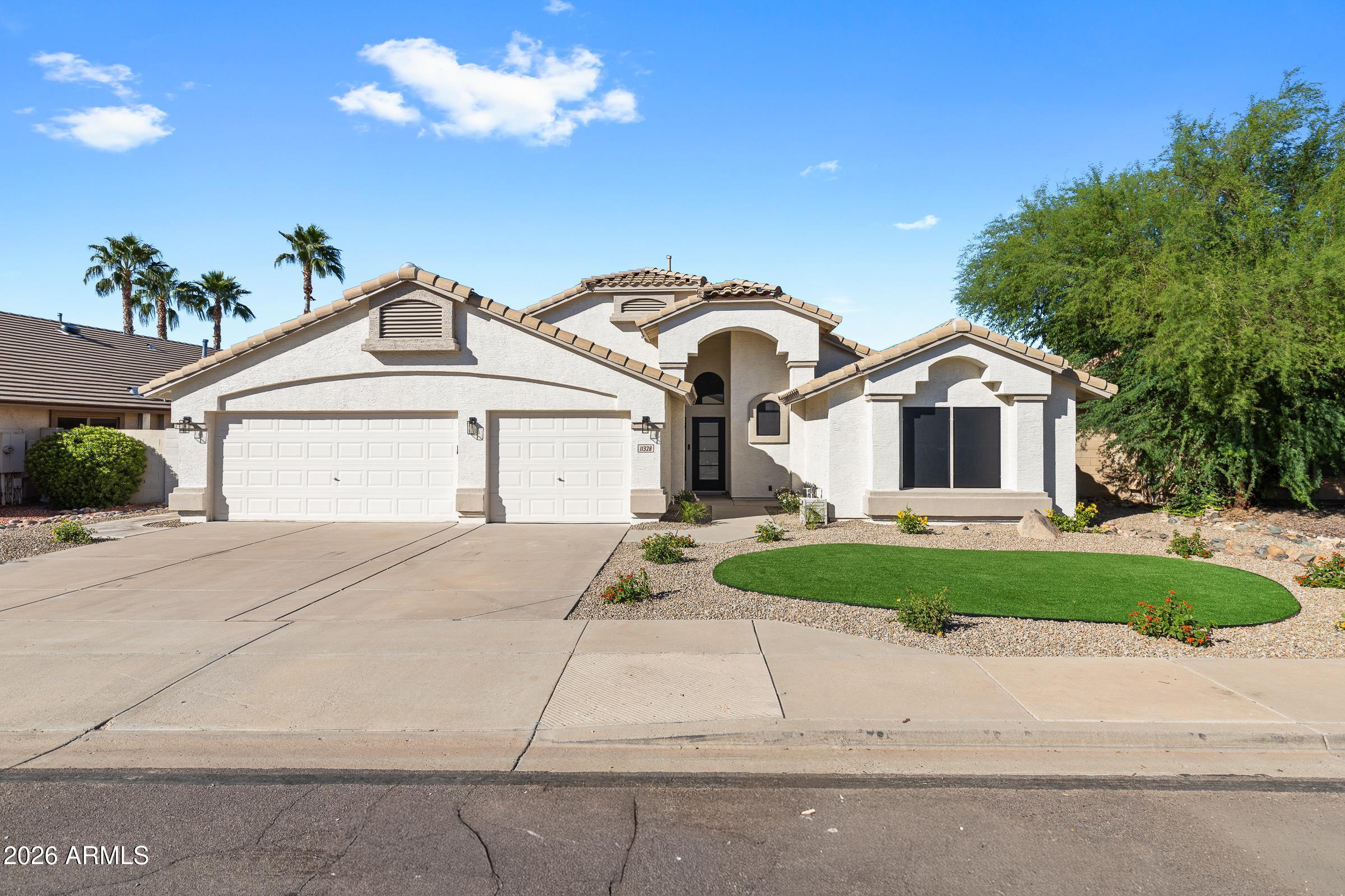 11328 E PETERSON Avenue