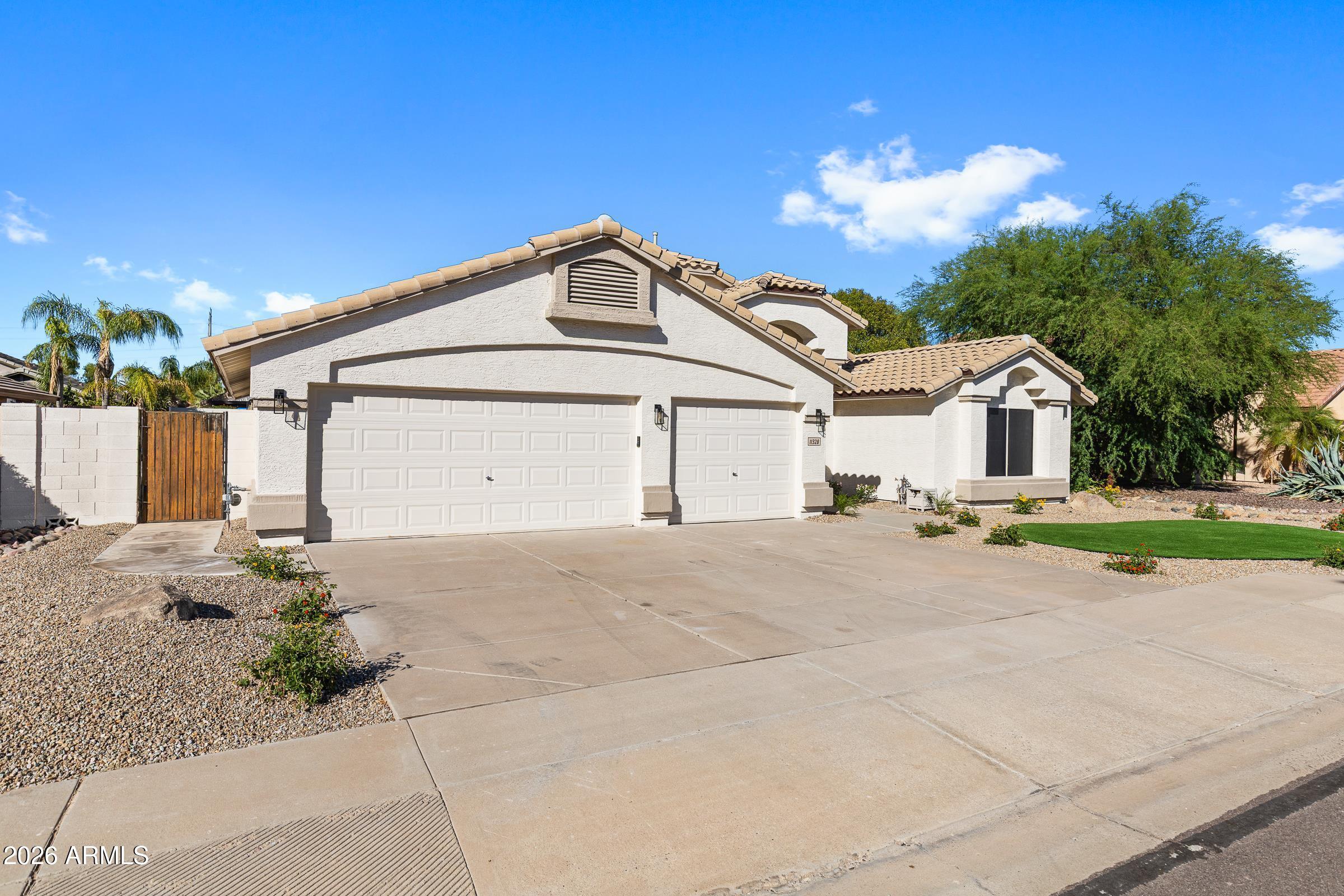 11328 E PETERSON Avenue