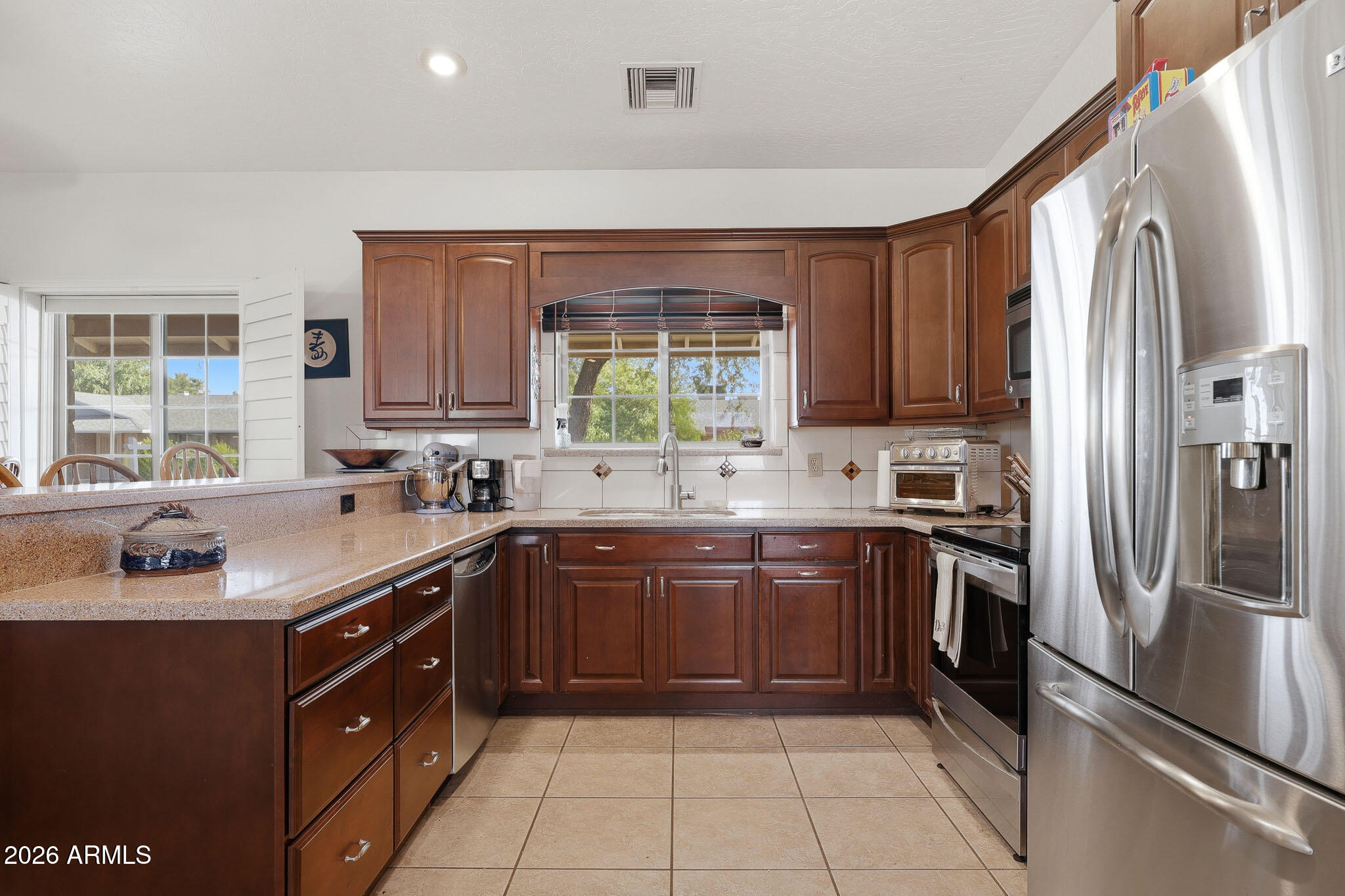 6140 E HOBART Street