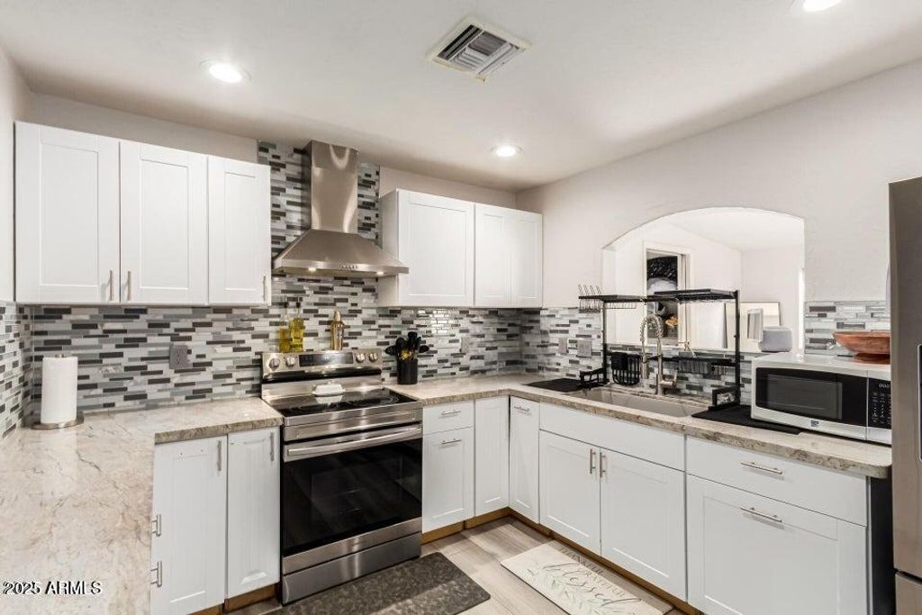 Photo of 677 W 22nd Avenue, Apache Junction, AZ 85120 (MLS # 6987188)