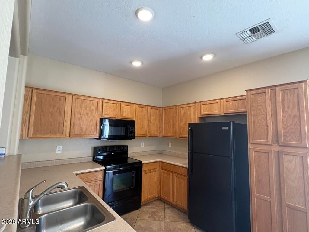 15337 W PORT AU PRINCE Lane