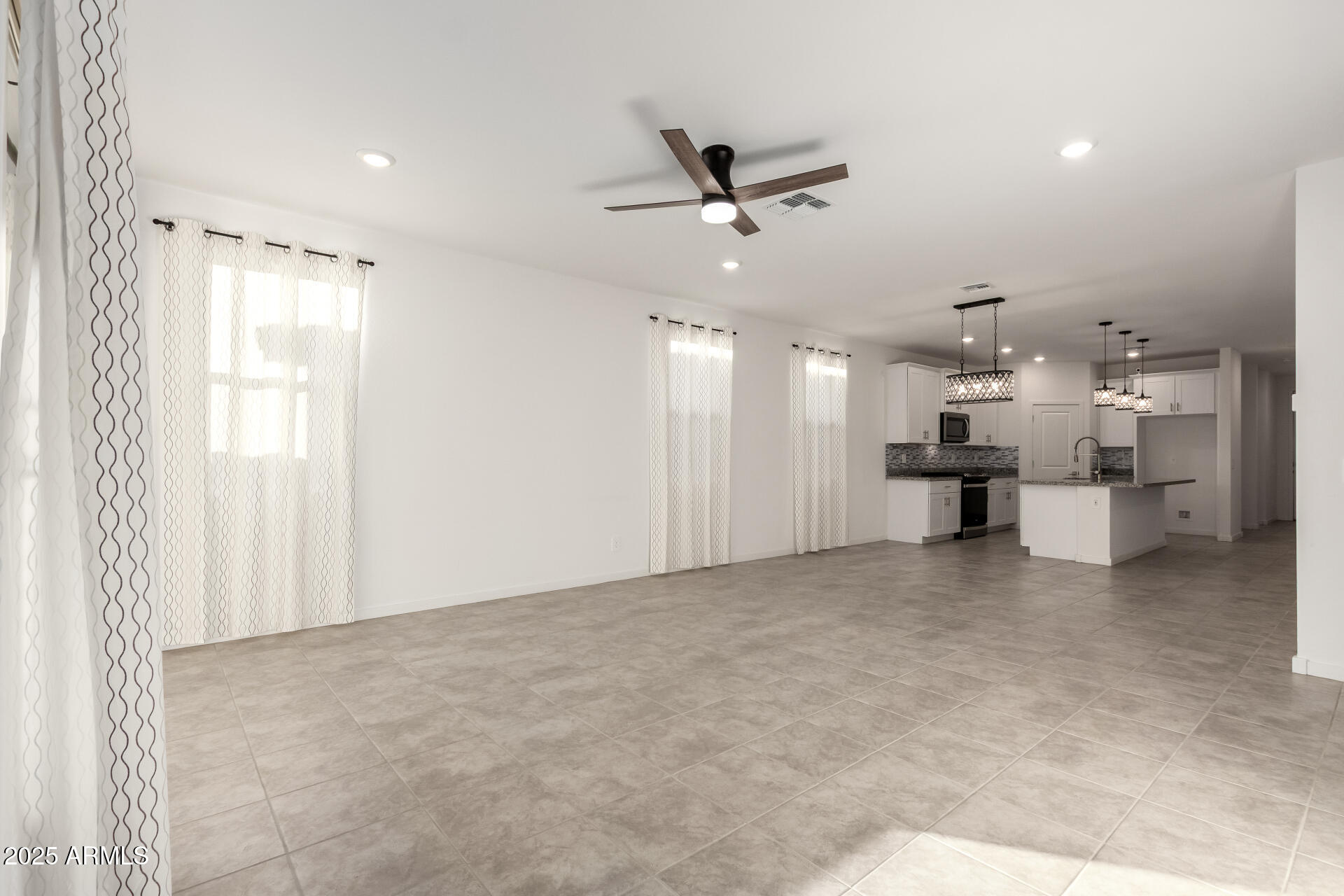 8937 W ALBENIZ Place