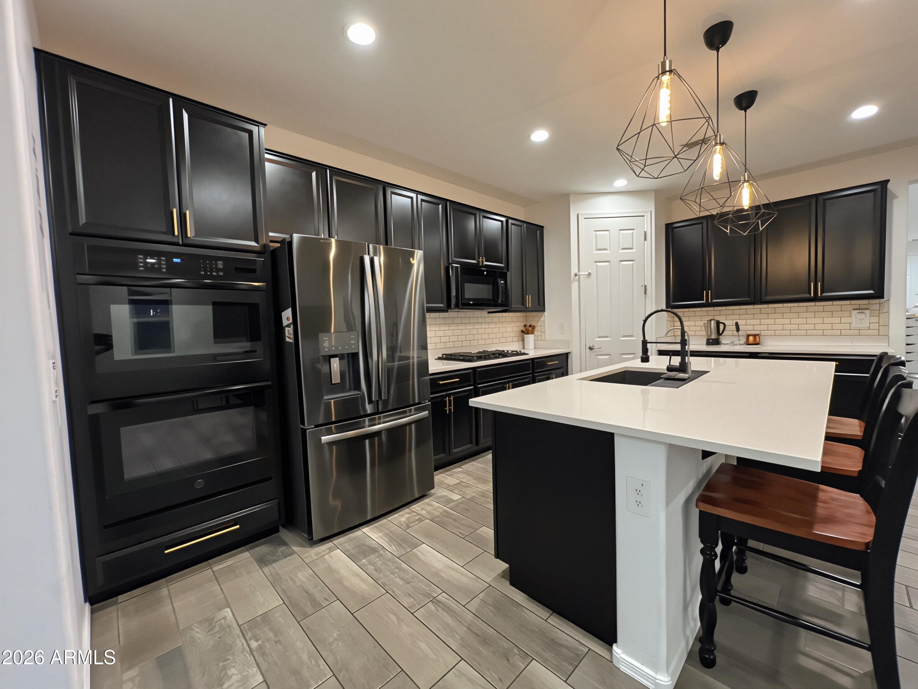 7914 W PUEBLO Avenue