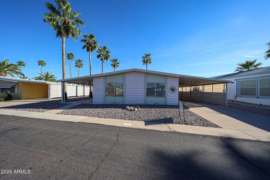 Price cut in half!  Nice home in good shape, furnished so all you need is your suitcase to move in. Roof is about 5 years old, AC is 2 years old as is water heater.  There is a nice az space accessible through patio doors from outside.  Everything is in nice shape, and you will especially like the walk in shower. and spacious living area.
Roof is about 5 years old, AC about 2, Hot water tank about 2.  55+ subdivision, new owner must qualify with the park.