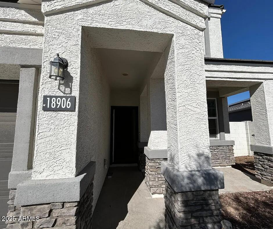 18906 W Woodlands Avenue