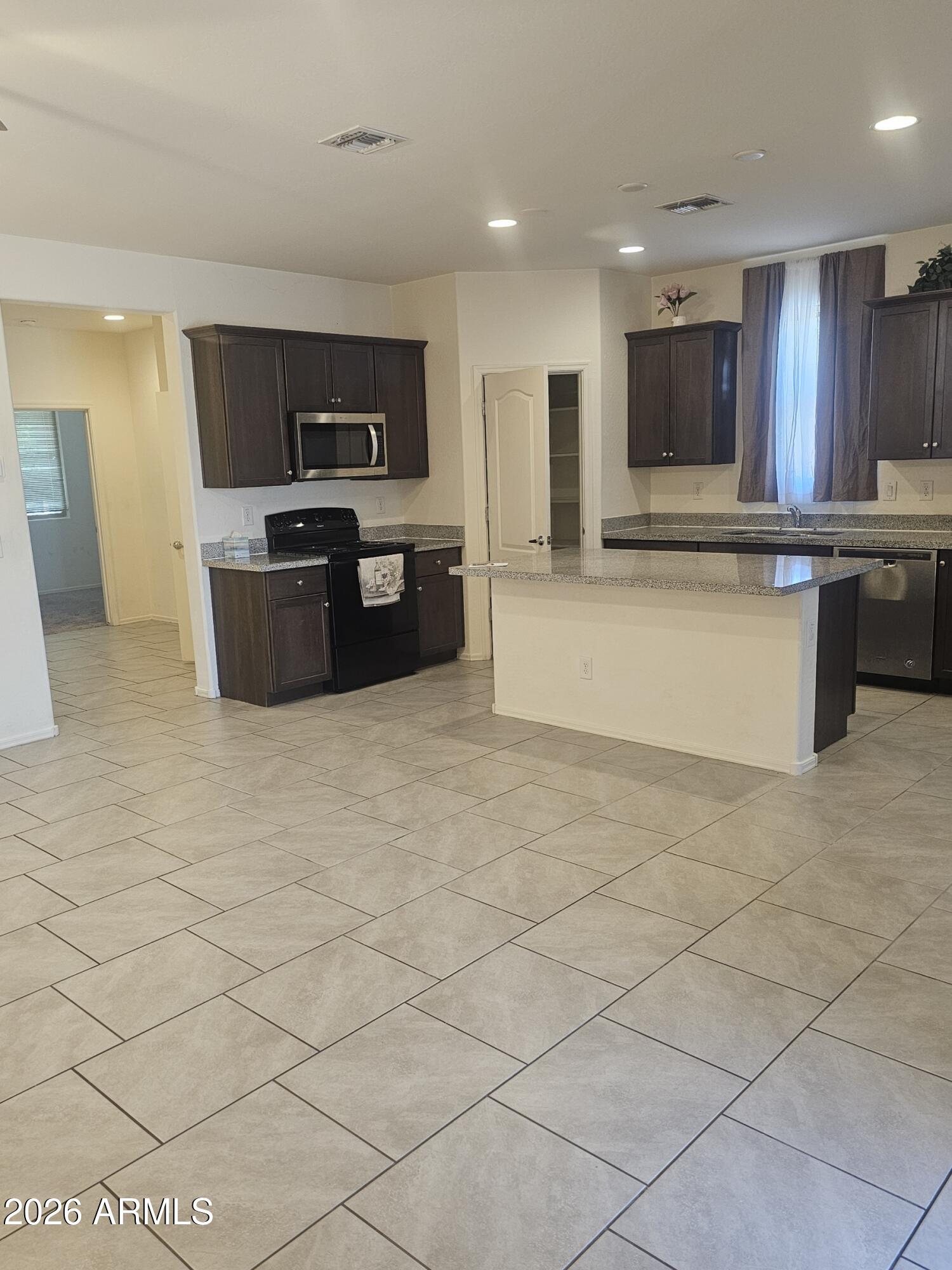 1650 E JARDIN Place