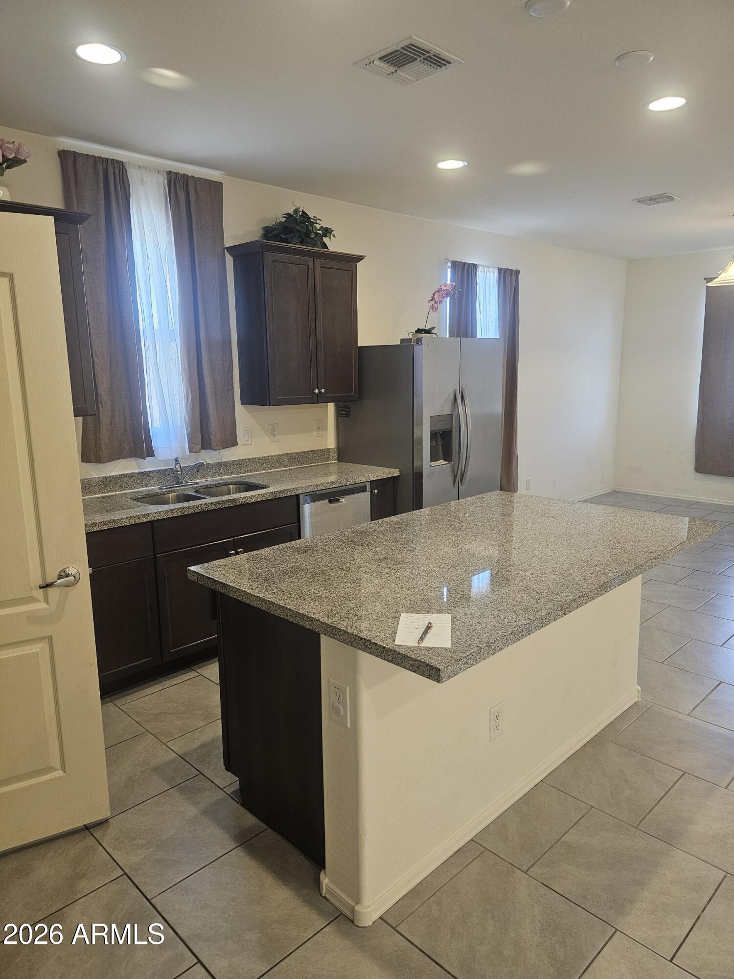 1650 E JARDIN Place