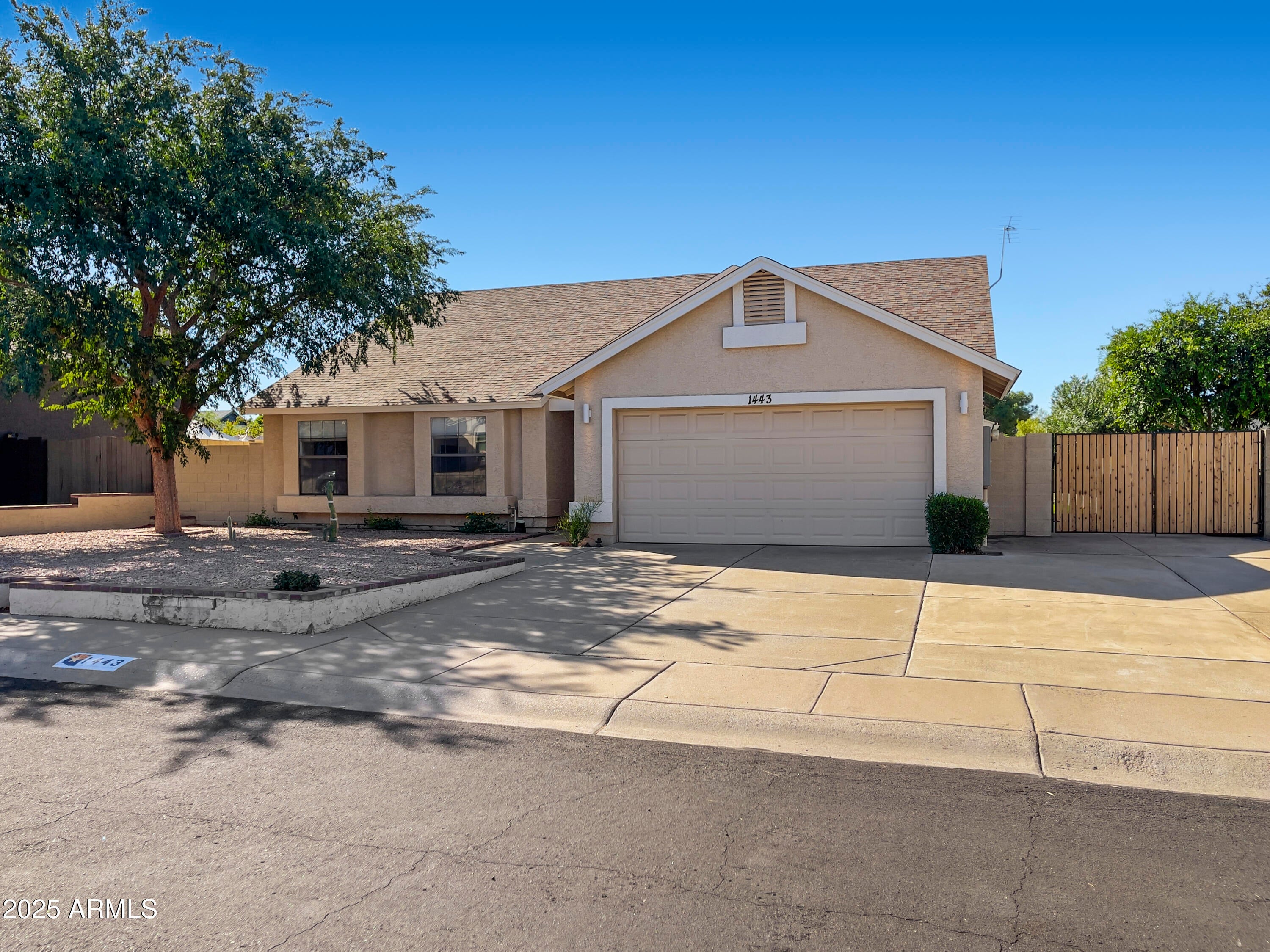 1443 E WICKIEUP Lane