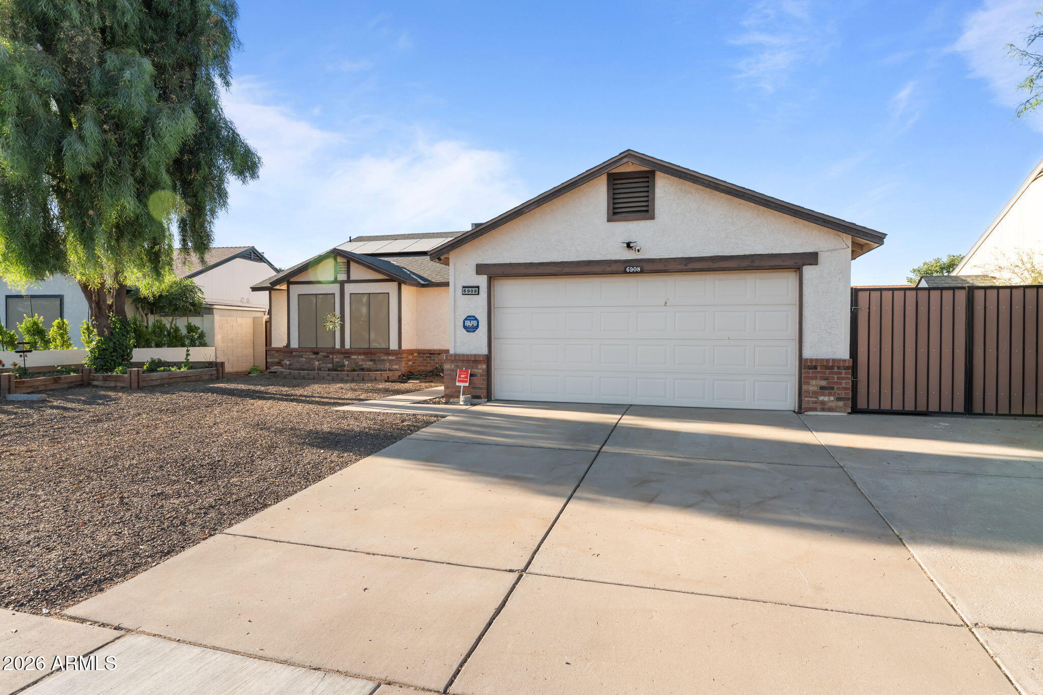 6908 W SIERRA VISTA Drive