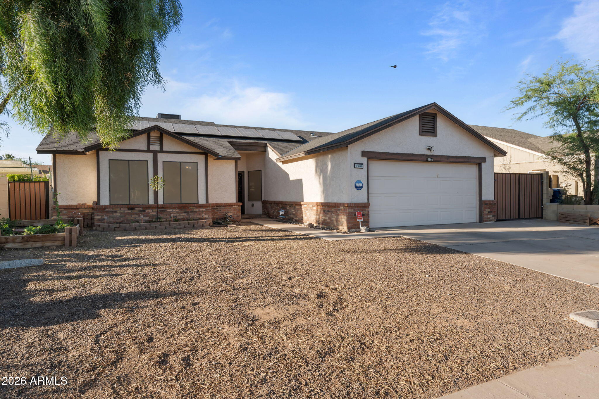 6908 W SIERRA VISTA Drive
